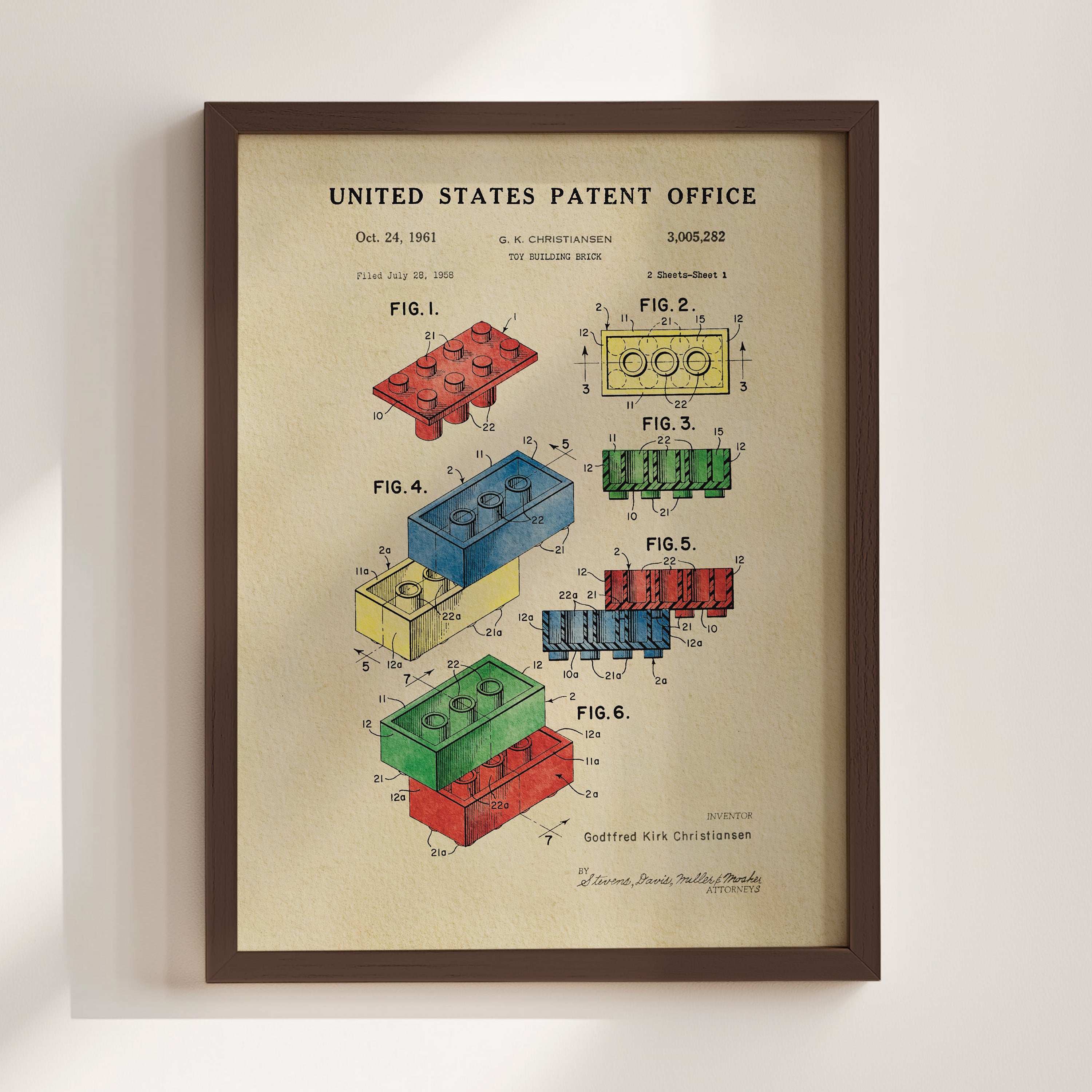The image is a framed patent drawing from the United States Patent Office, depicting various Lego brick designs and their corresponding patent applications.
