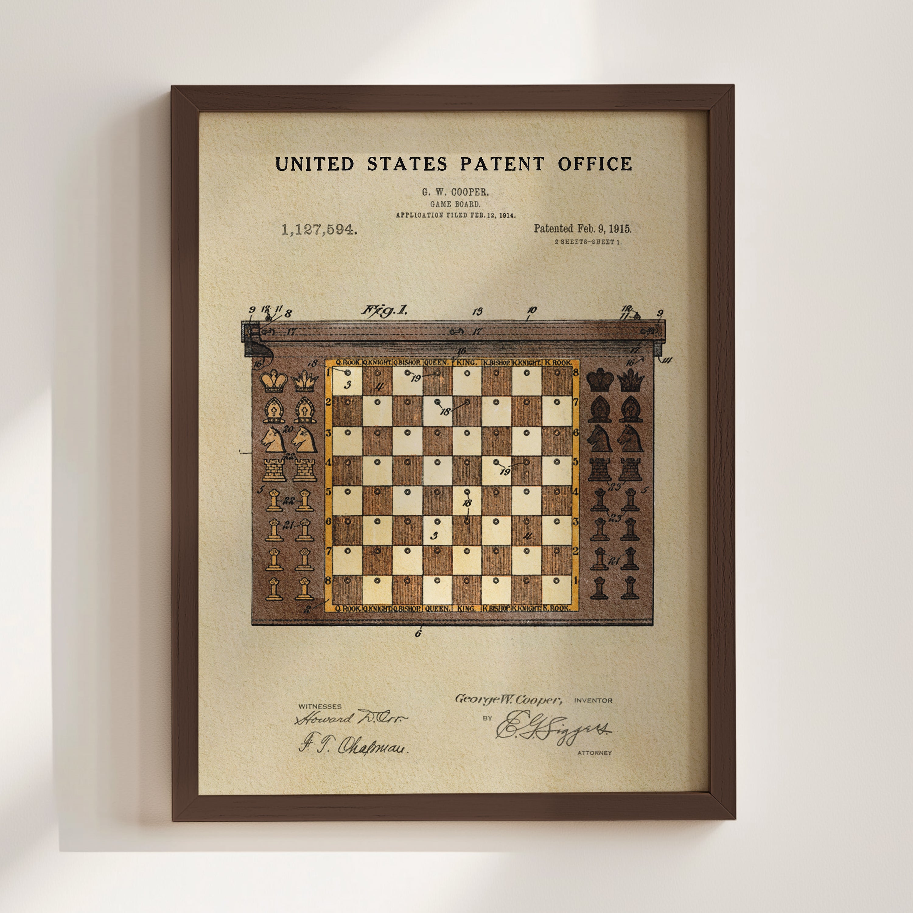 The image is a framed print of a chessboard with a patent drawing of a chess game, dated February 15, 1915.
