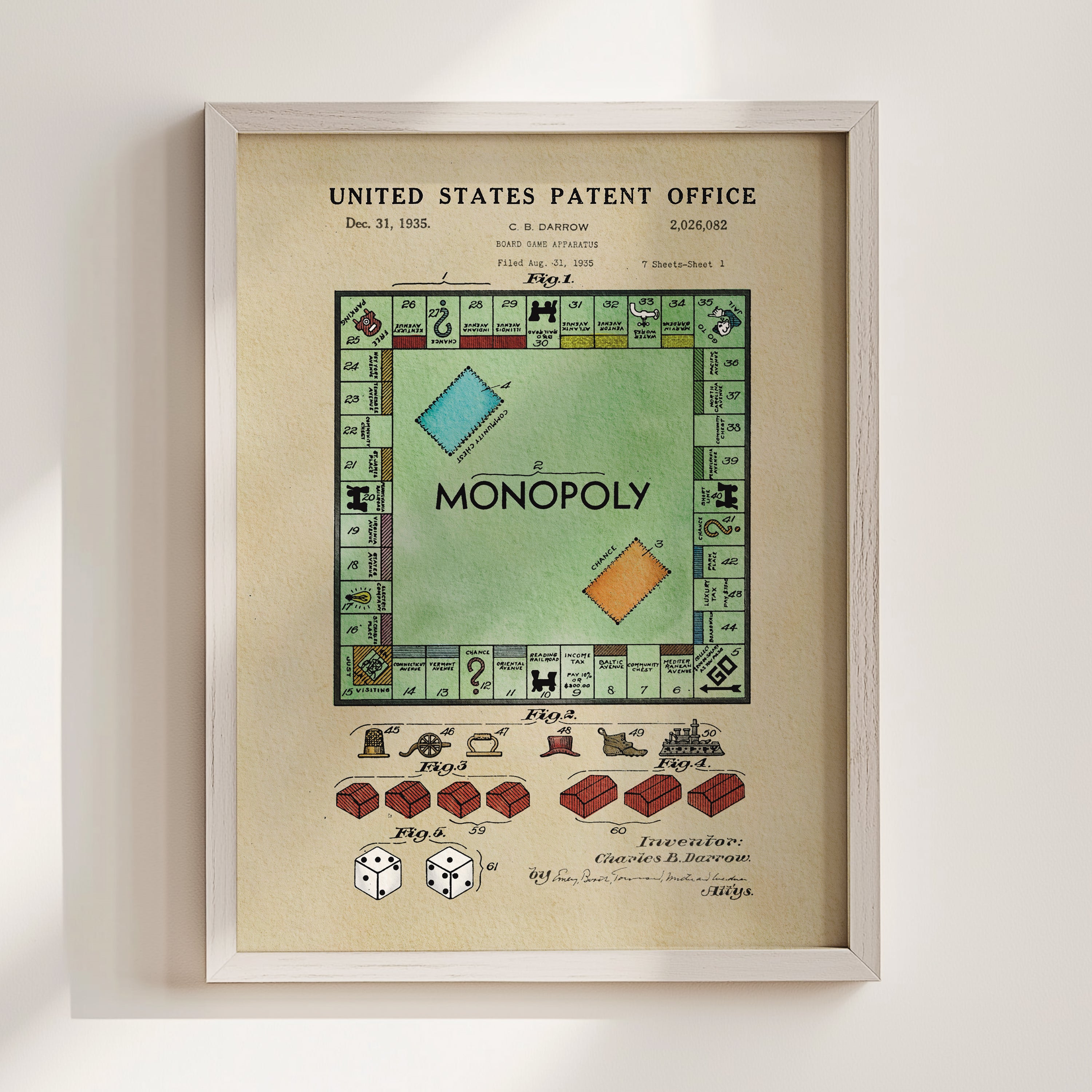 The image is a framed print of the Monopoly board game patent application dated December 31, 1935, with a detailed illustration of the Monopoly board and various game components.