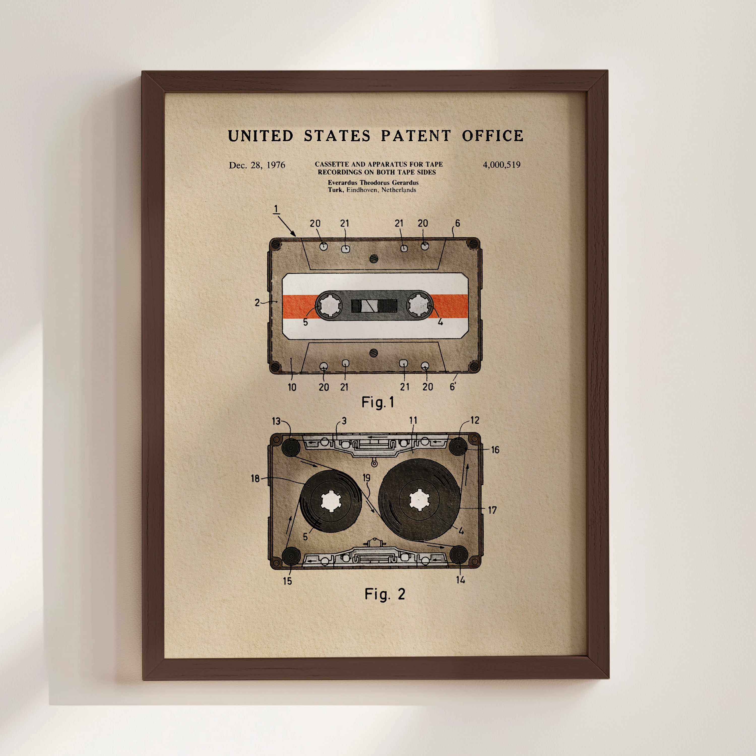 The image is a framed patent drawing depicting a cassette tape and a tape recorder, with accompanying technical drawings and text.