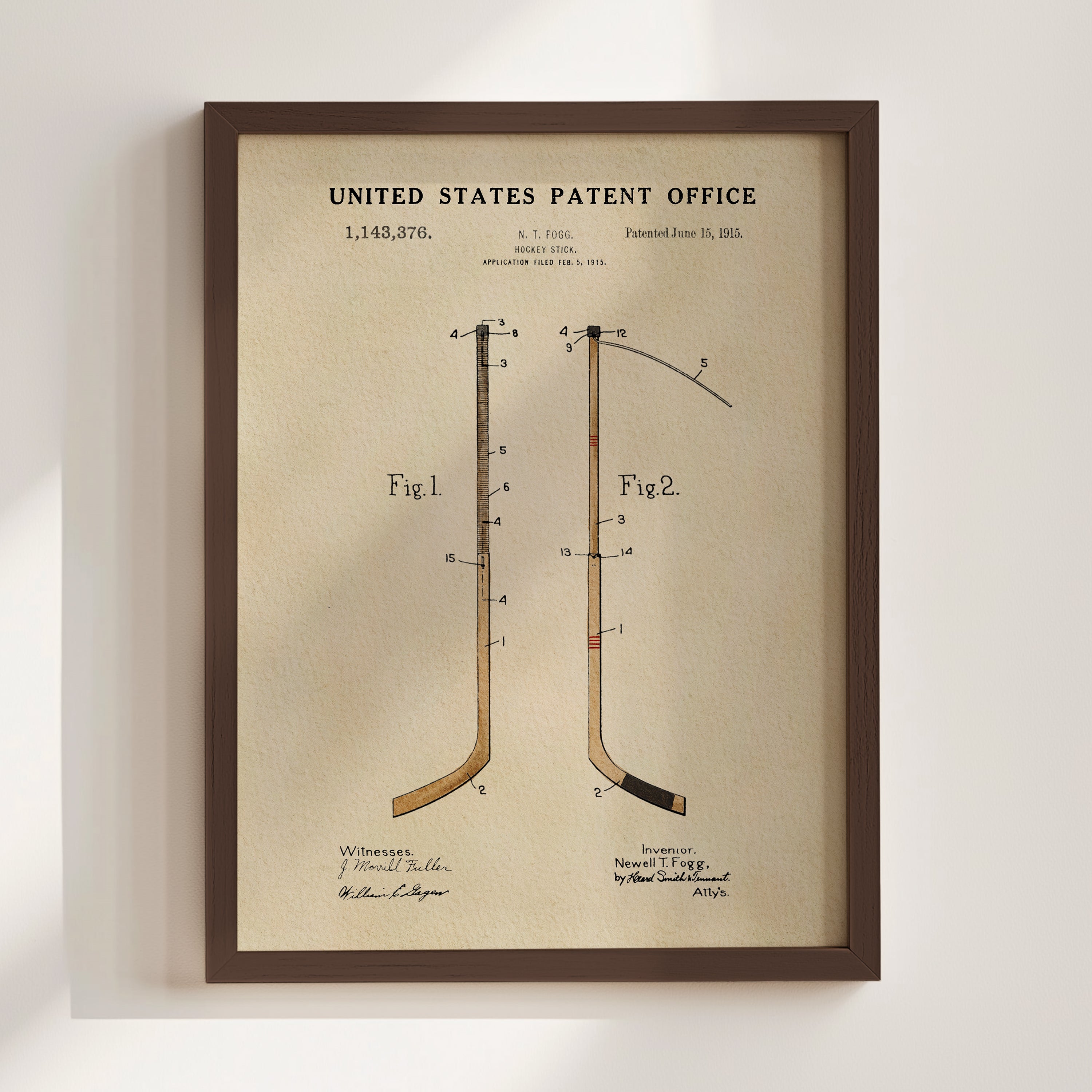 The image is a framed patent drawing depicting a hockey stick with a unique design, likely inspired by the invention of the hockey stick in the United States Patent Office.