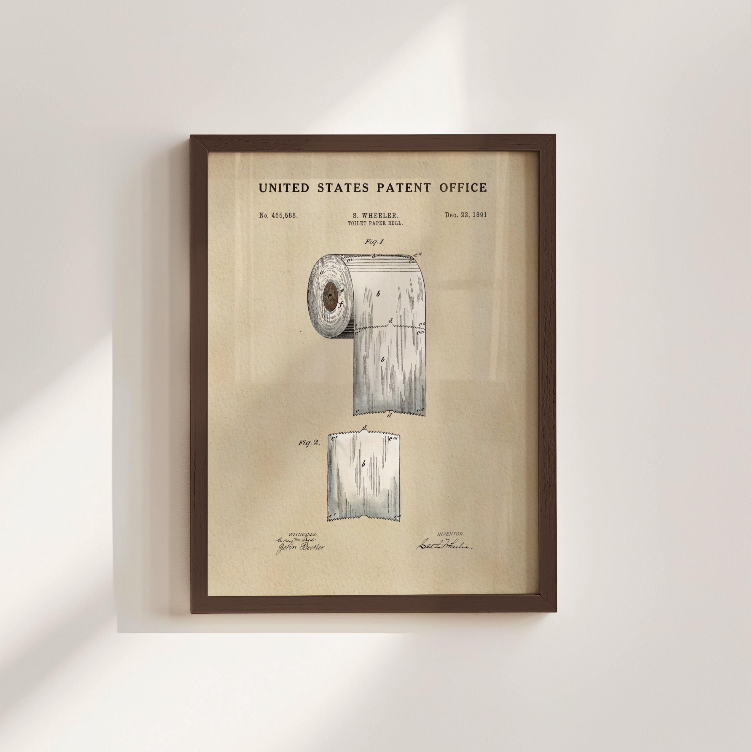 The image is a framed print of a toilet paper patent from the United States Patent Office, depicting a roll of toilet paper with a diagram and text.