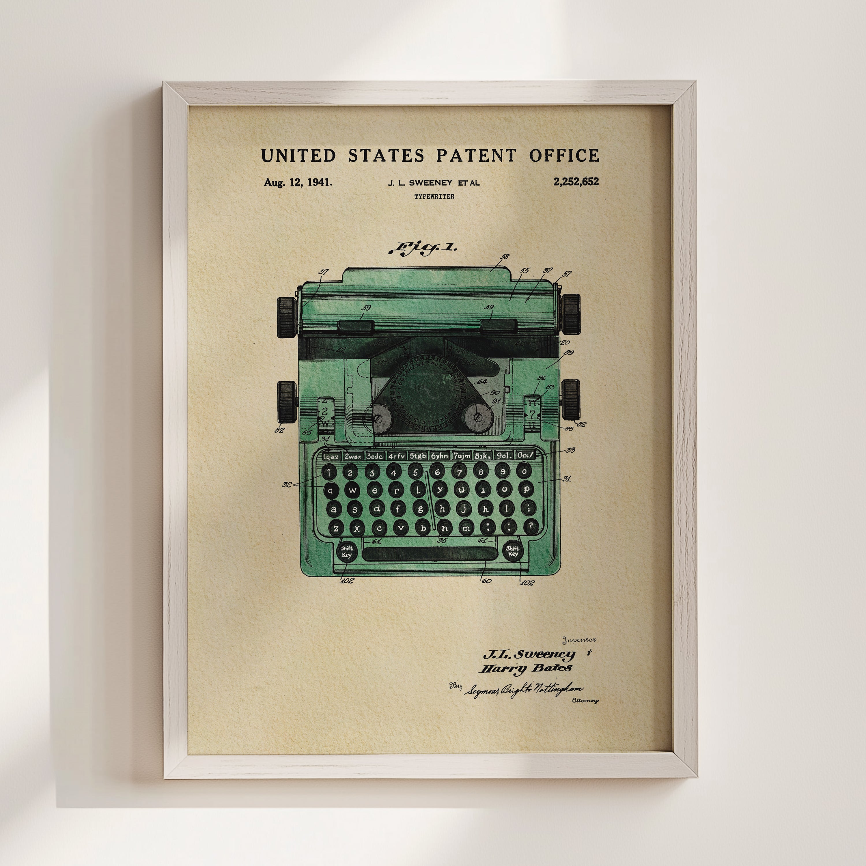 The image is a framed patent drawing of a typewriter, depicting the design and features of the device.