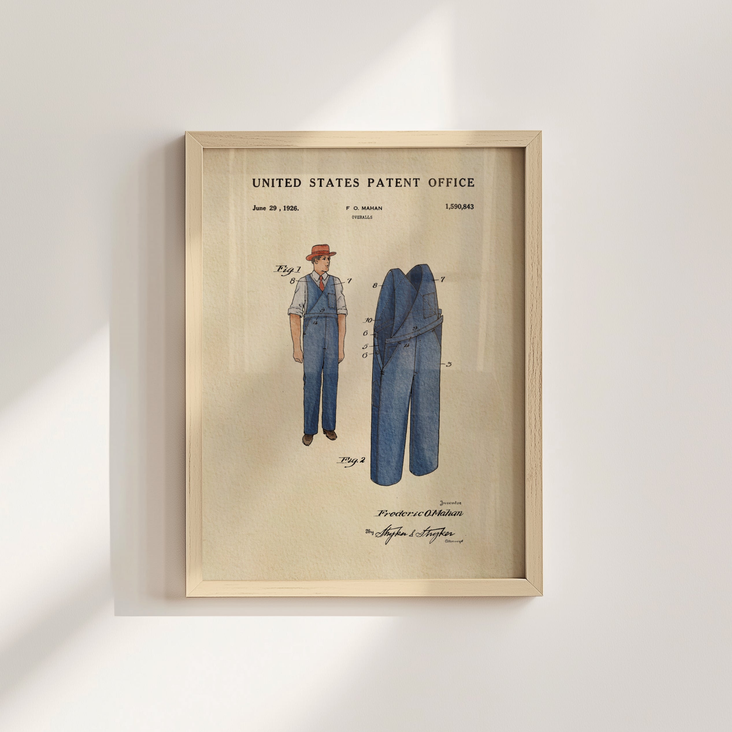 The image is a framed patent drawing depicting a man's overalls from the year 1920.