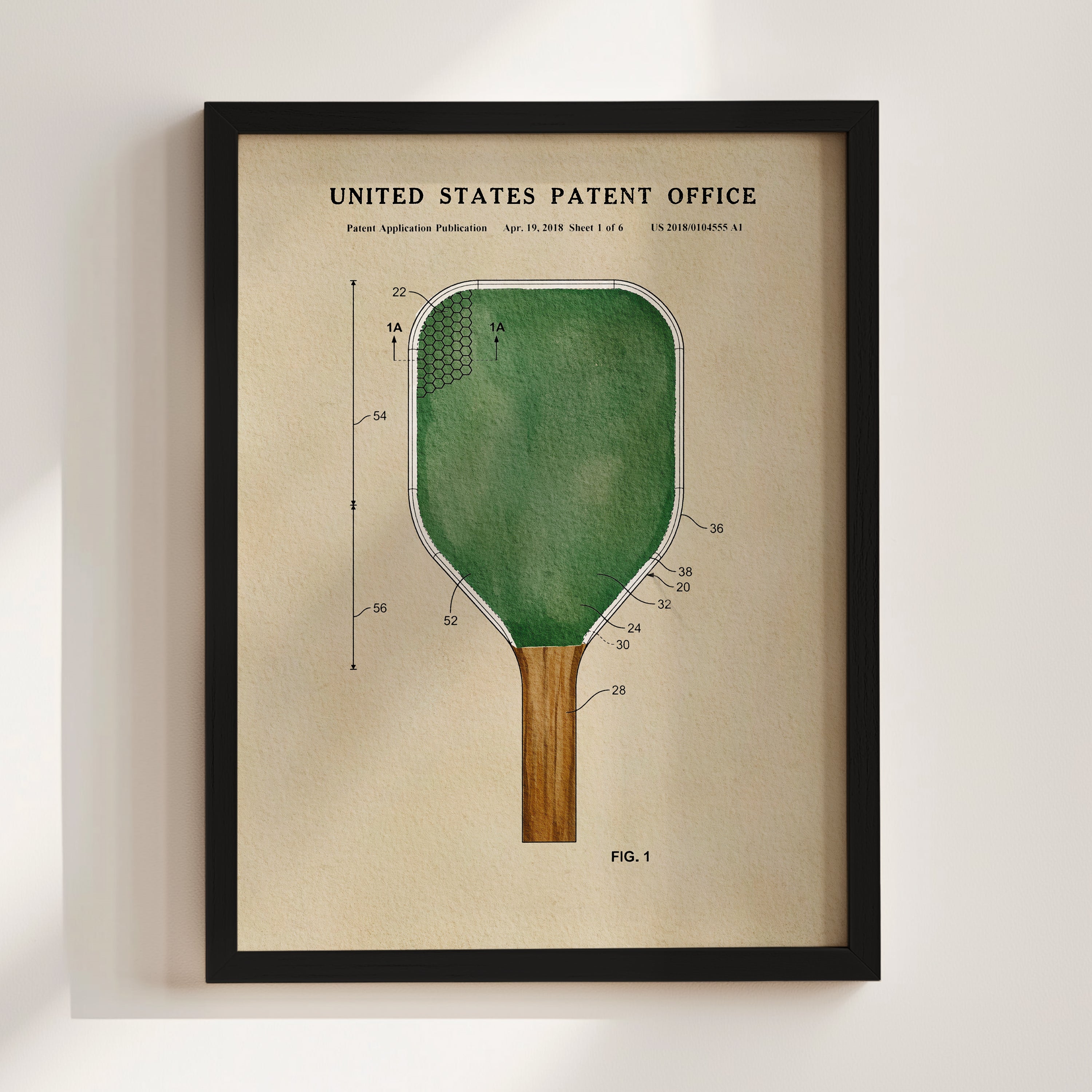 The image is a framed patent drawing of a paddle, depicting the design and features of the paddle in a detailed manner.