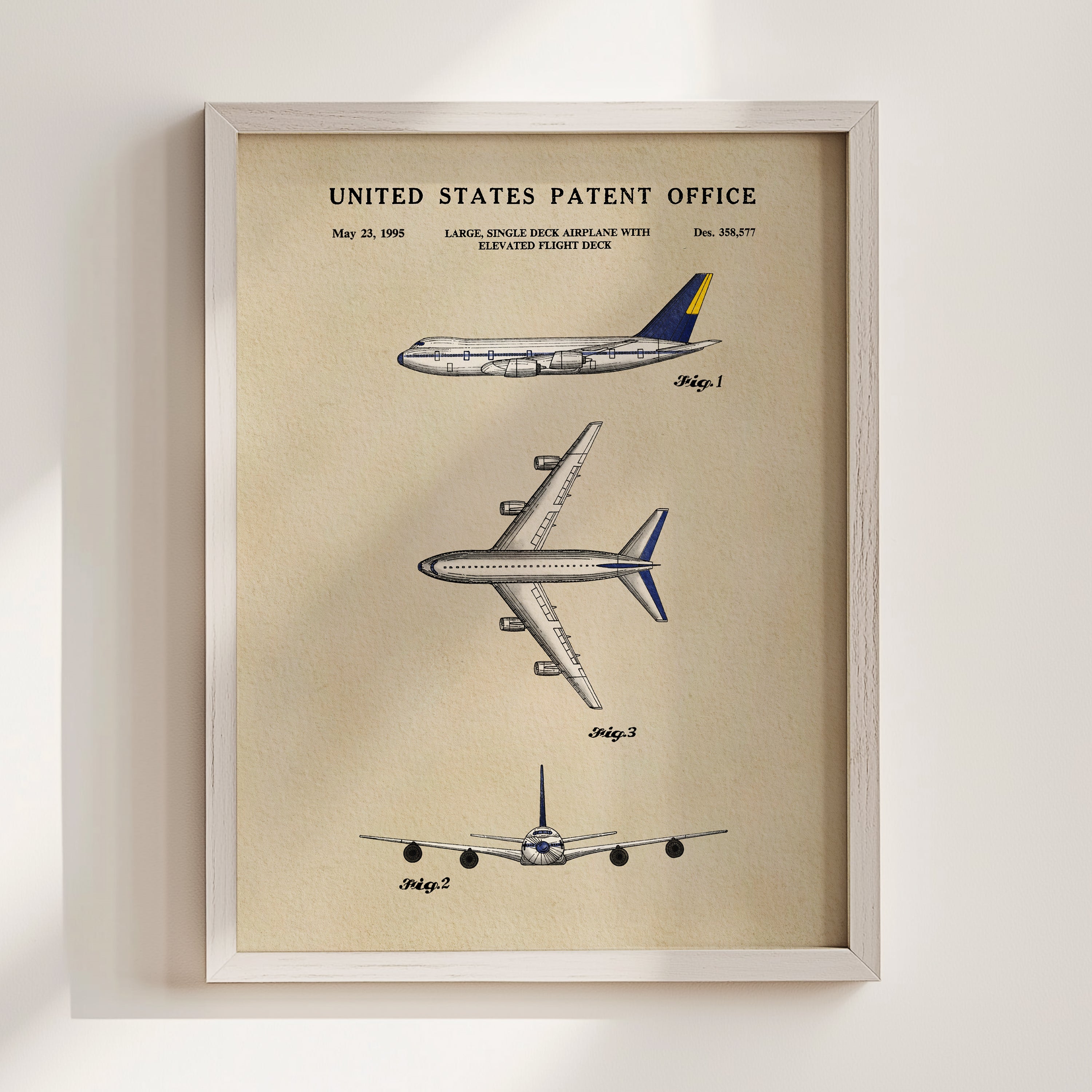 The image is a framed patent drawing depicting three different airplanes, including a large single-engine airplane with an elevated flight deck.