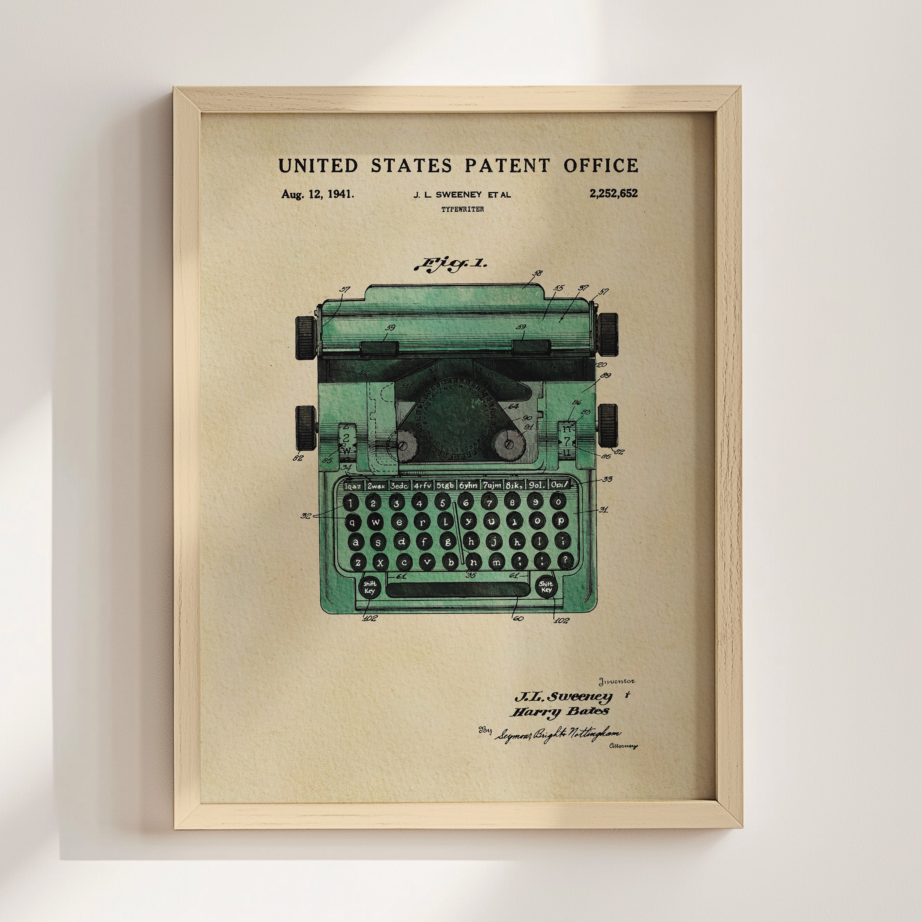 The image is a framed patent drawing of a typewriter, depicting the design and features of the device.