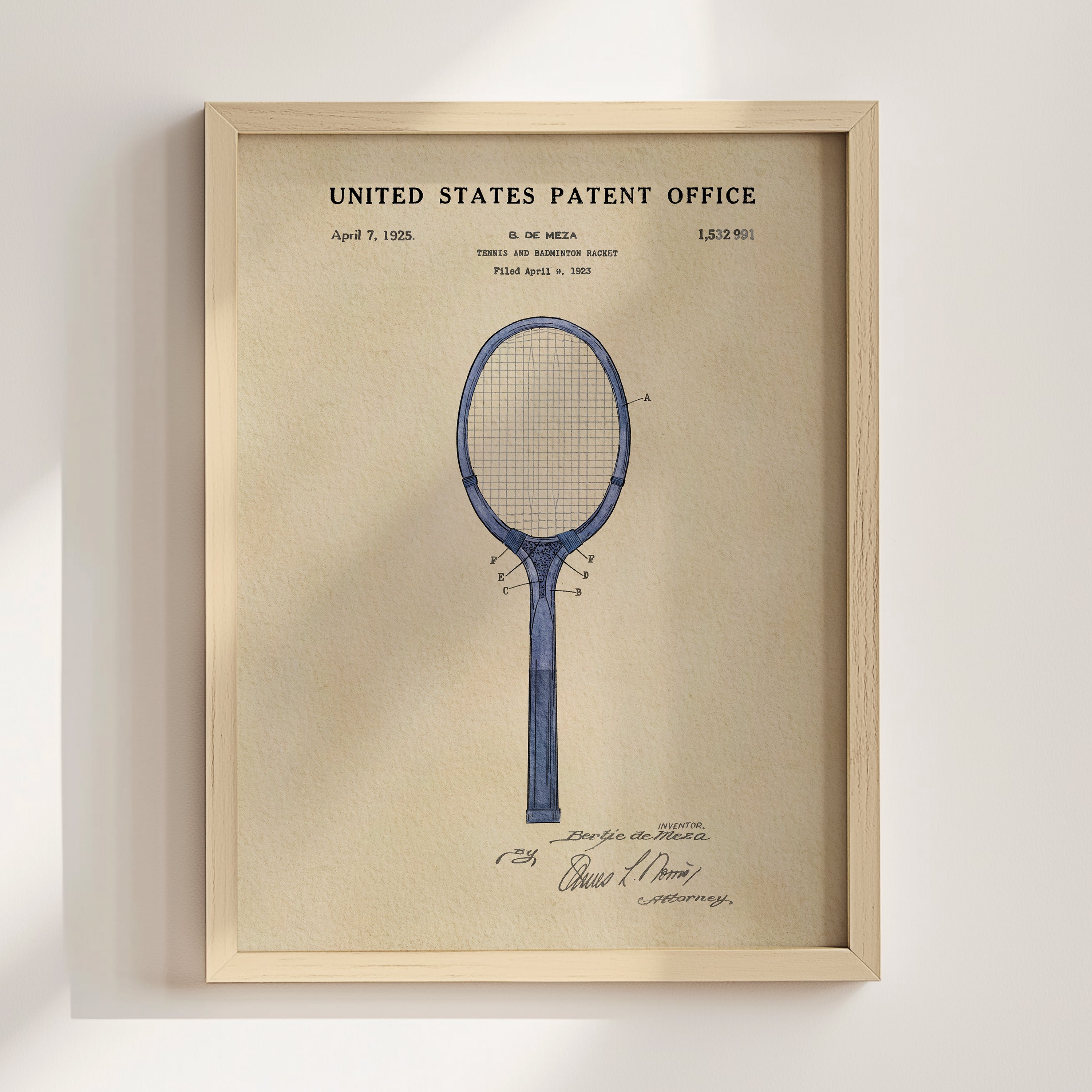 The image is a framed print of a blue tennis racket with a patent registration from the United States Patent Office dated April 1, 1925.