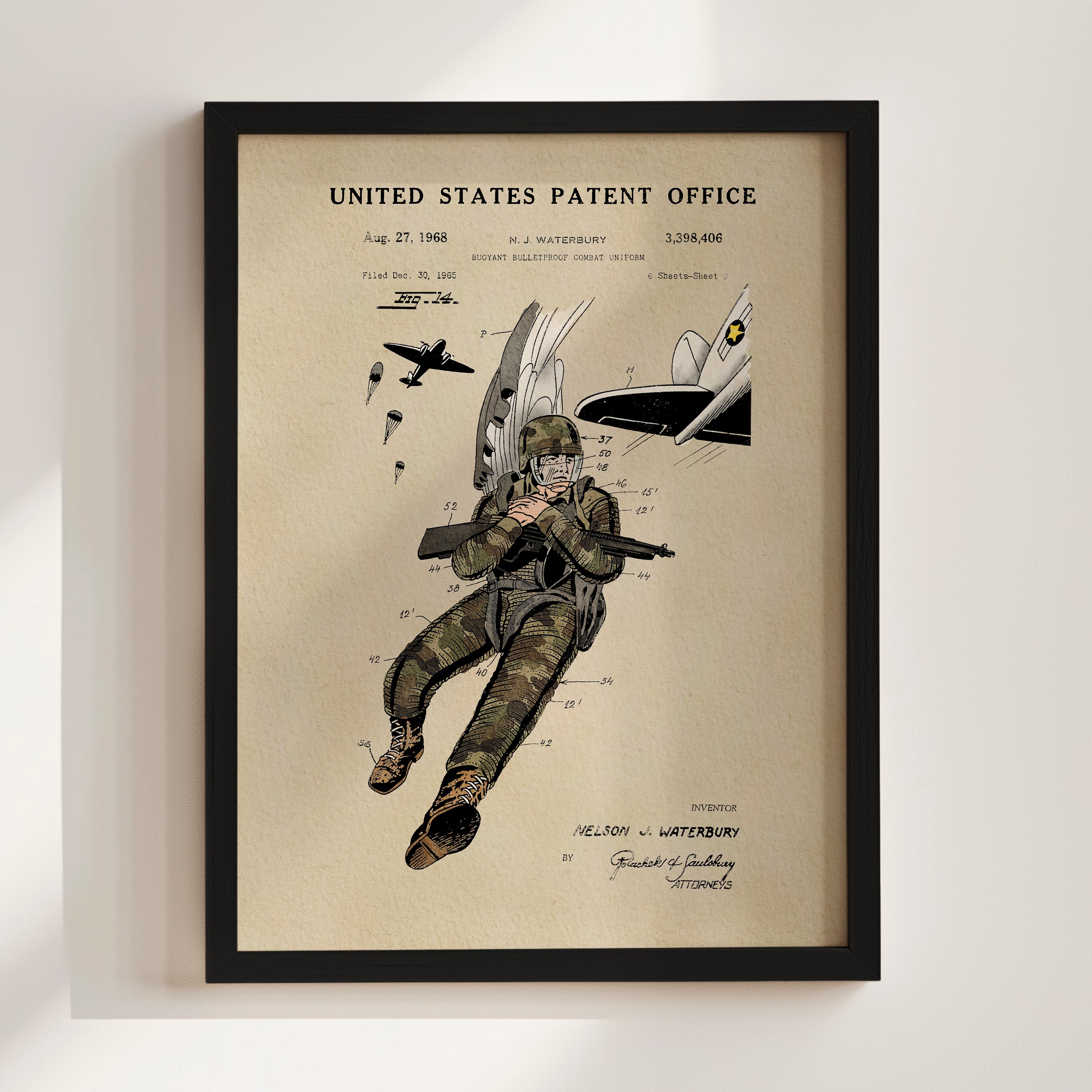 The image is a framed print featuring a military figure in camouflage uniform, holding a rifle, and surrounded by various military-related elements such as parachutes and a plane.