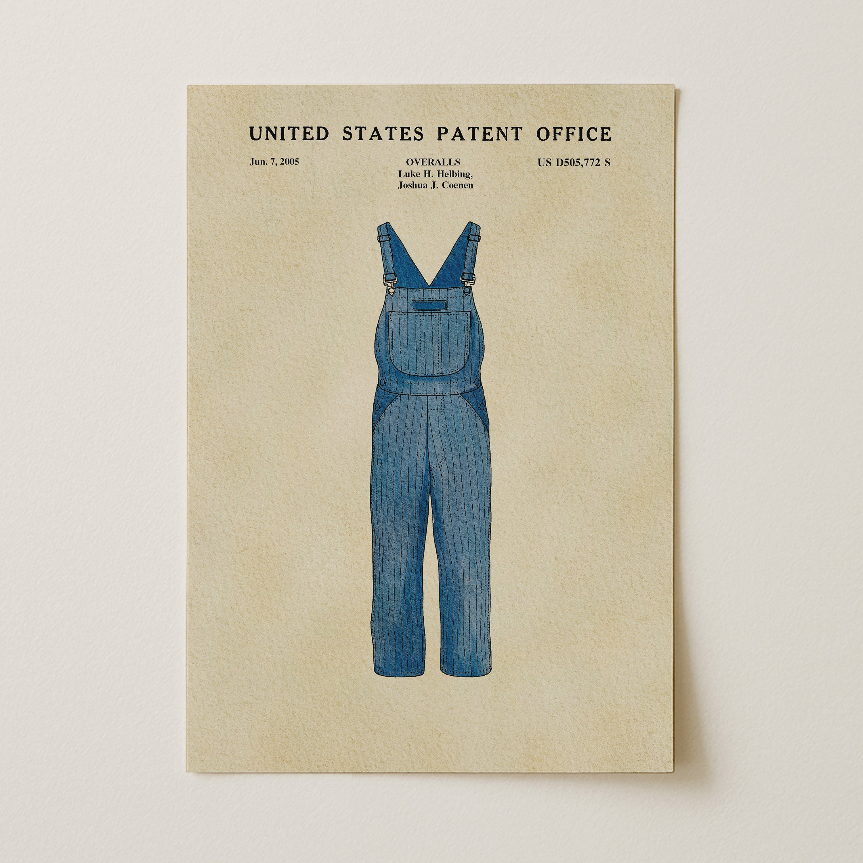 A framed illustration of a pair of blue overalls with the text