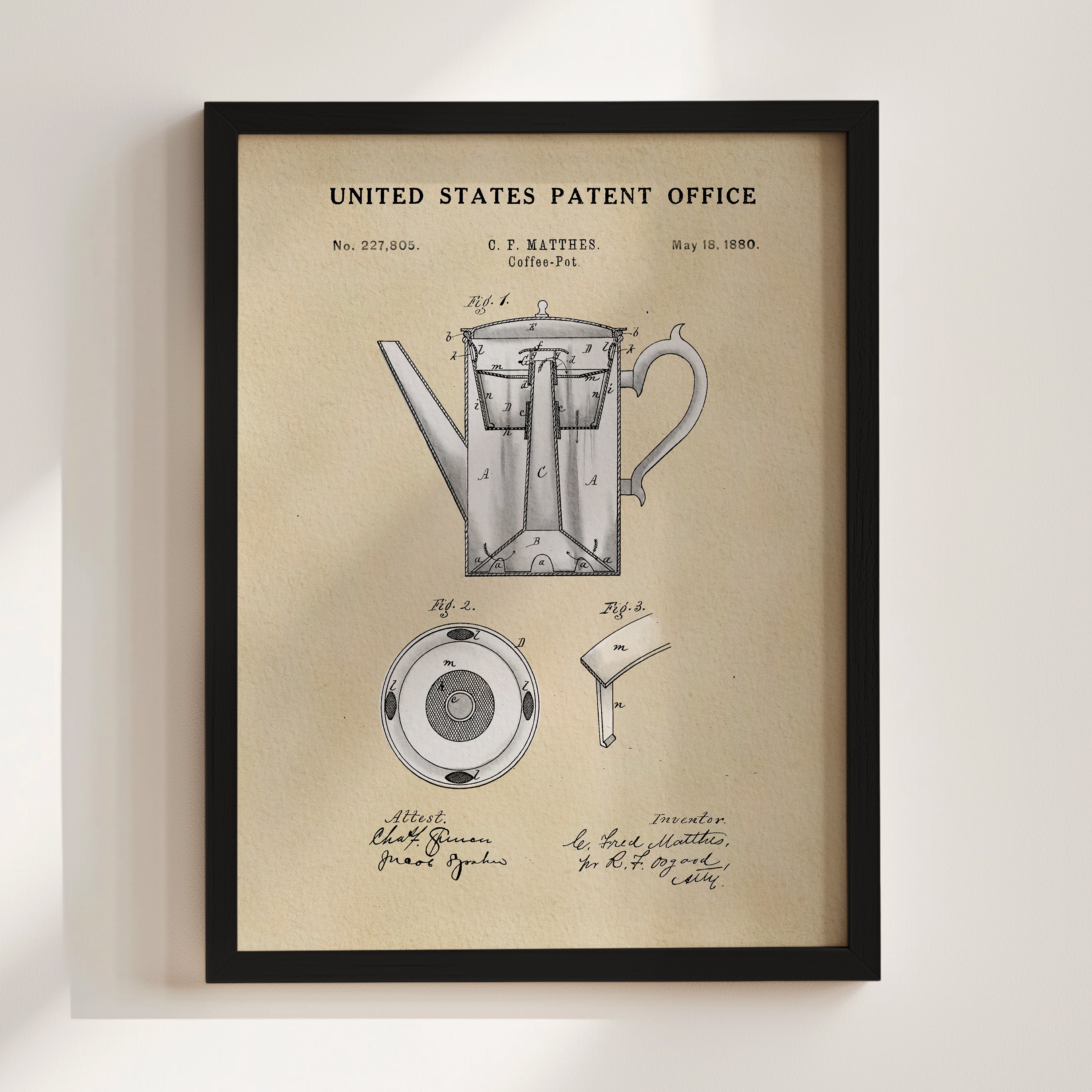 The image is a framed patent drawing of a coffee pot, depicting the design and features of the product.