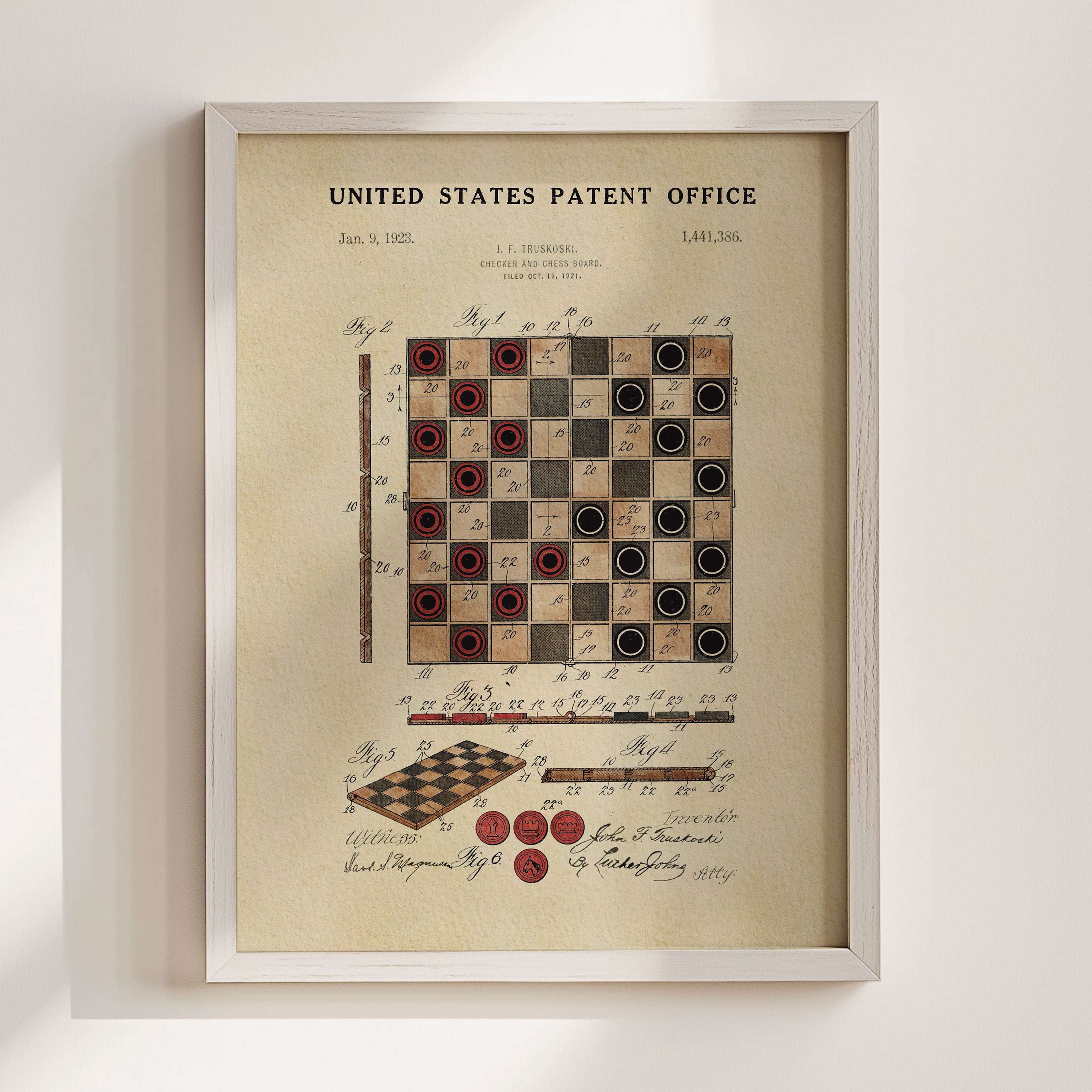 The image is a framed vintage patent drawing depicting a checkerboard with checkers, along with a detailed technical drawing and text.
