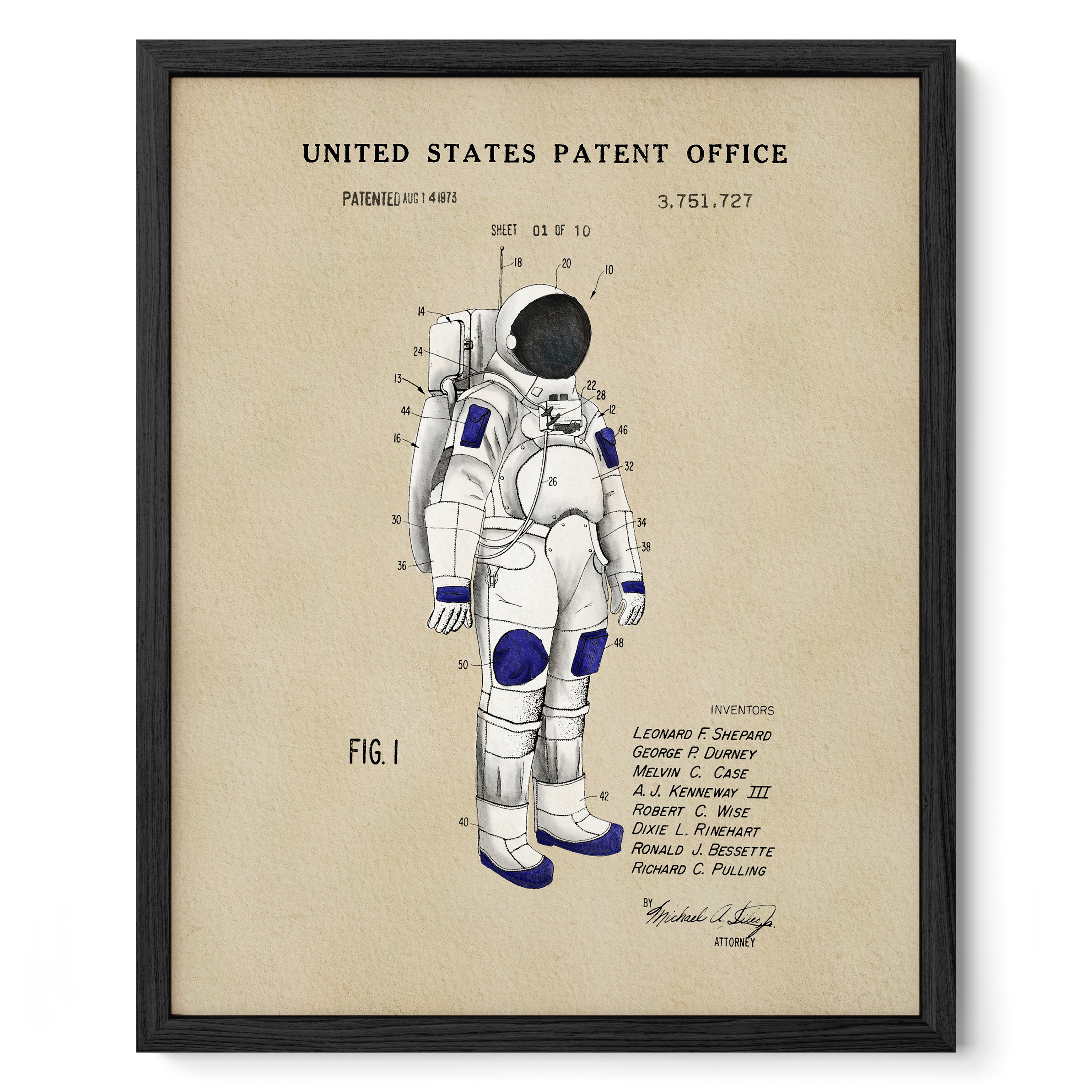 The image is a framed print depicting a detailed illustration of a spacesuit, likely from the United States Patent Office.