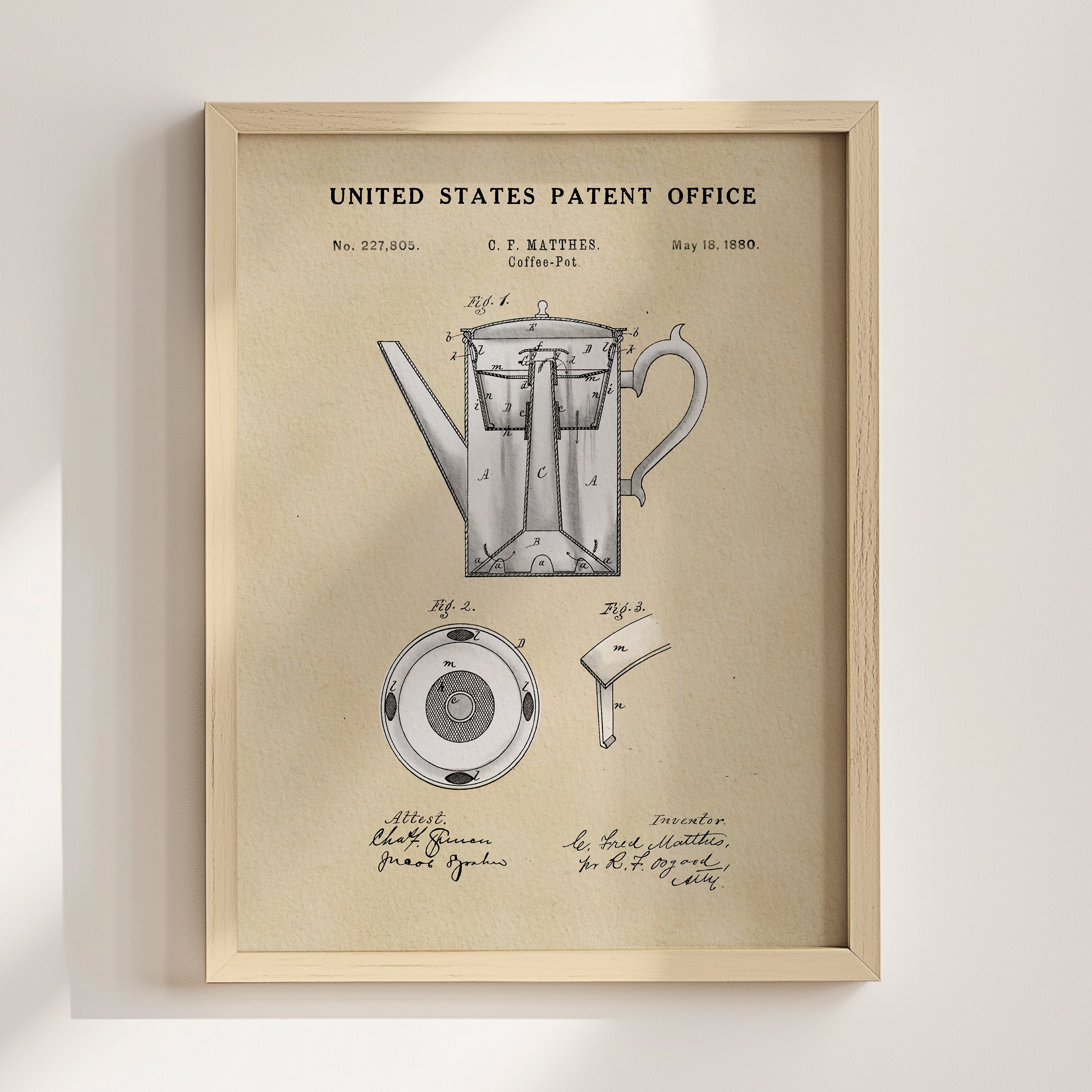 The image is a framed patent drawing of a coffee pot, depicting the design and features of the product.