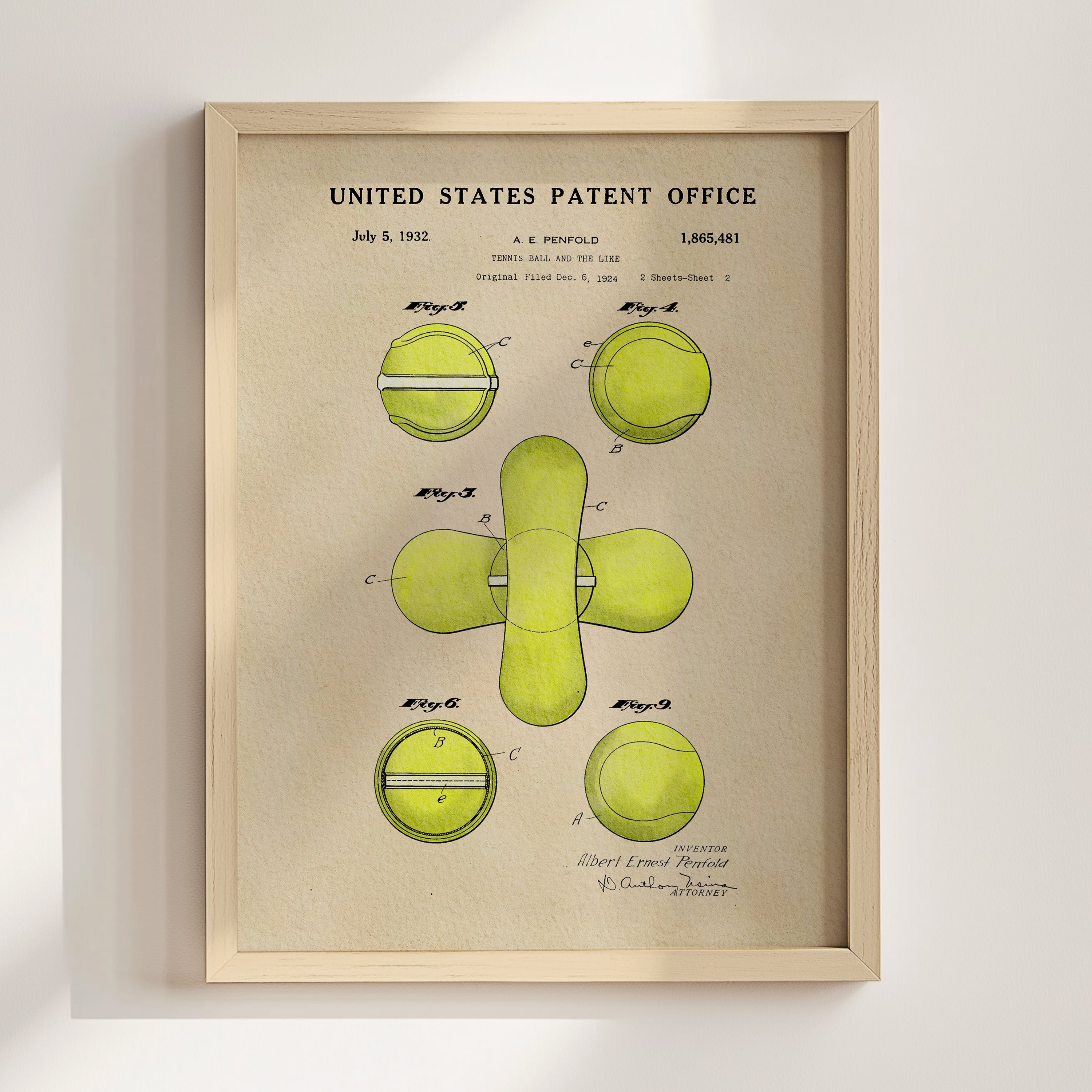 The image is a framed patent drawing depicting a tennis ball and racket.