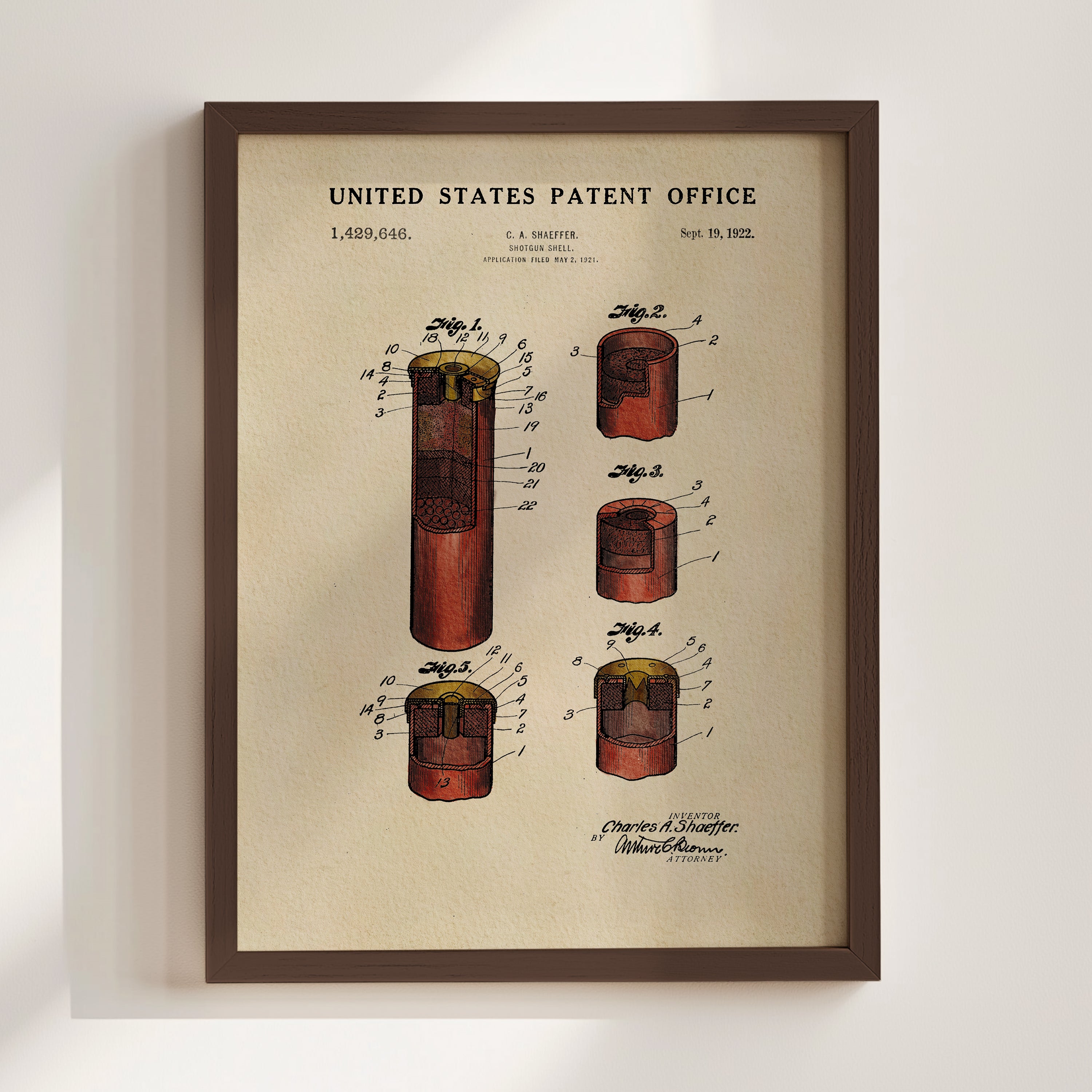 The image is a framed patent drawing depicting a device with multiple components, including a red cylinder, a yellow cylinder, and a red cylinder. The drawing is labeled with the United States Patent Office and includes a date of September 19, 1920.