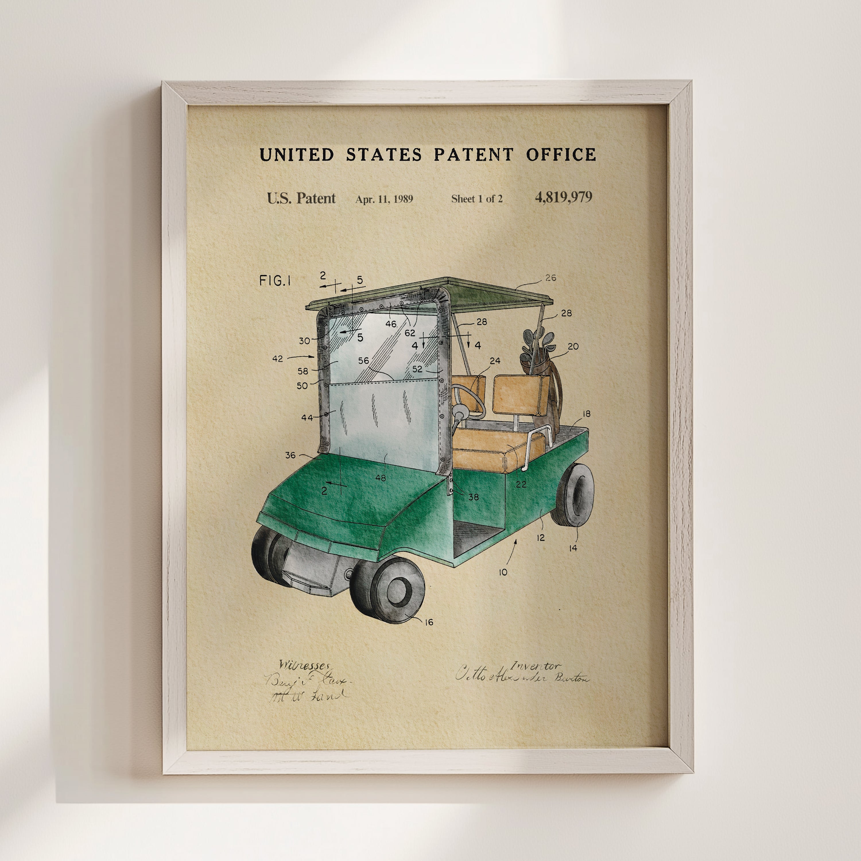 The image is a framed patent drawing depicting a golf cart, with various technical drawings and labels surrounding it.