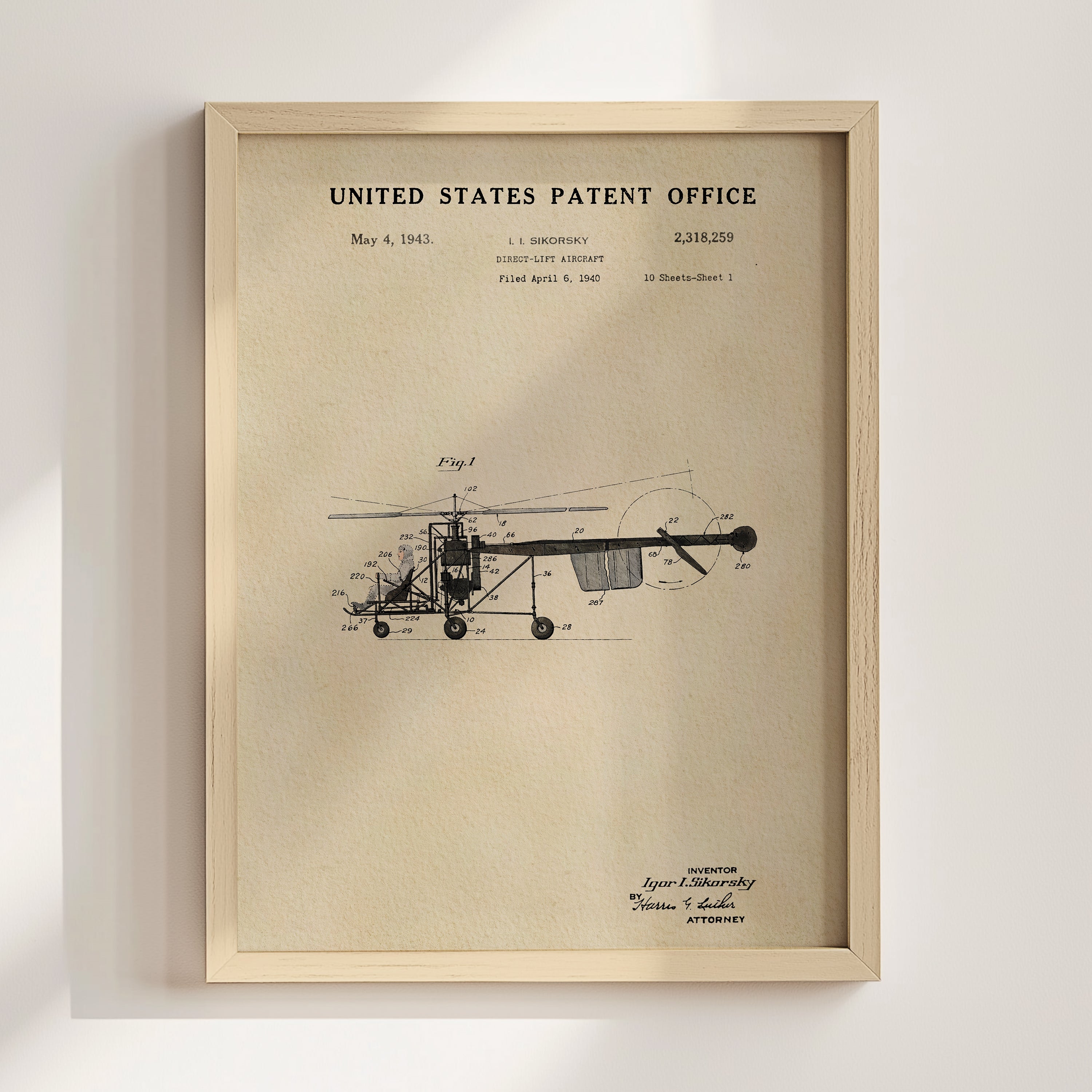 The image is a framed patent drawing of a helicopter from the United States Patent Office, dated May 4, 1943.