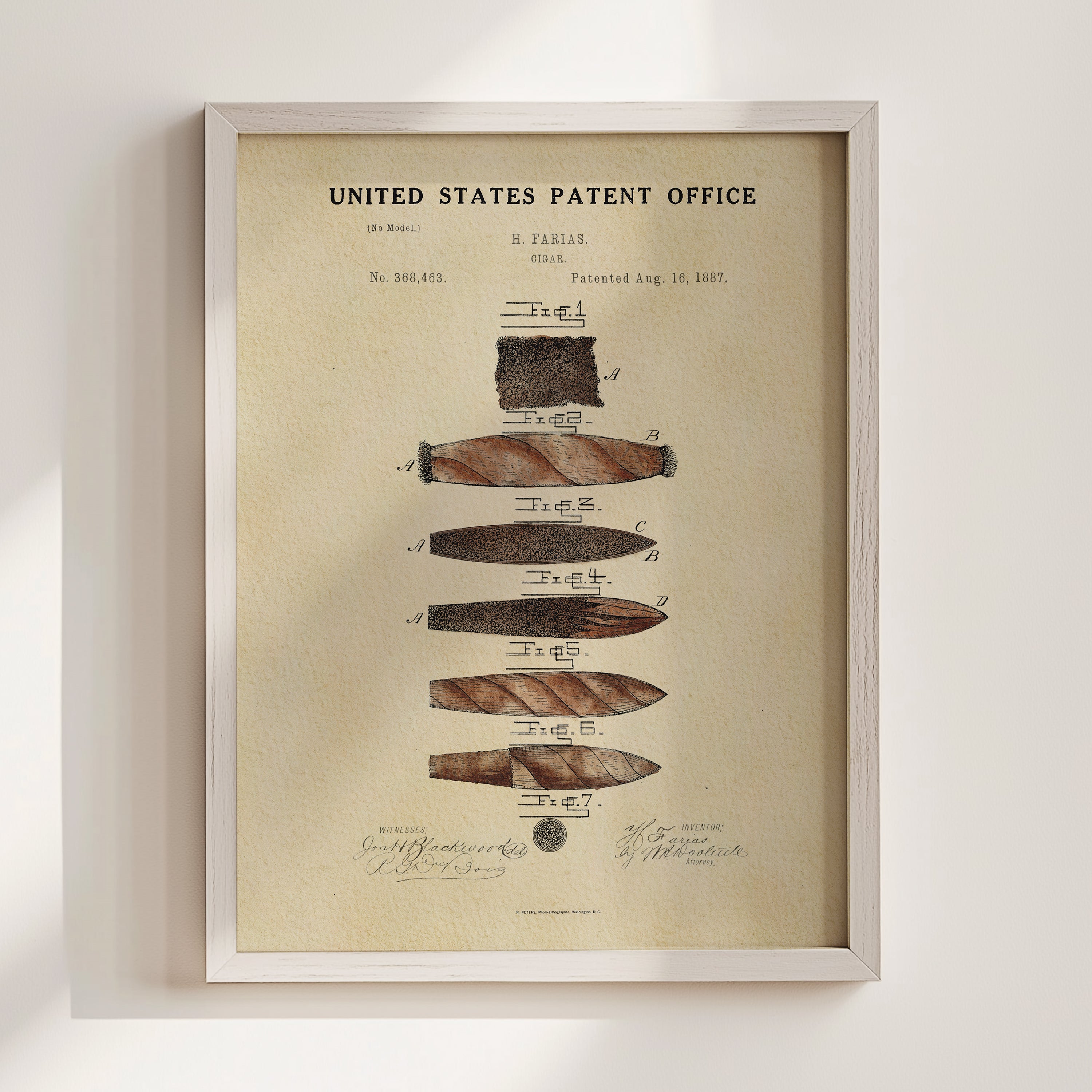 The image is a framed print of a United States patent office patent filing from 1887, featuring a detailed drawing and description of a cigar.
