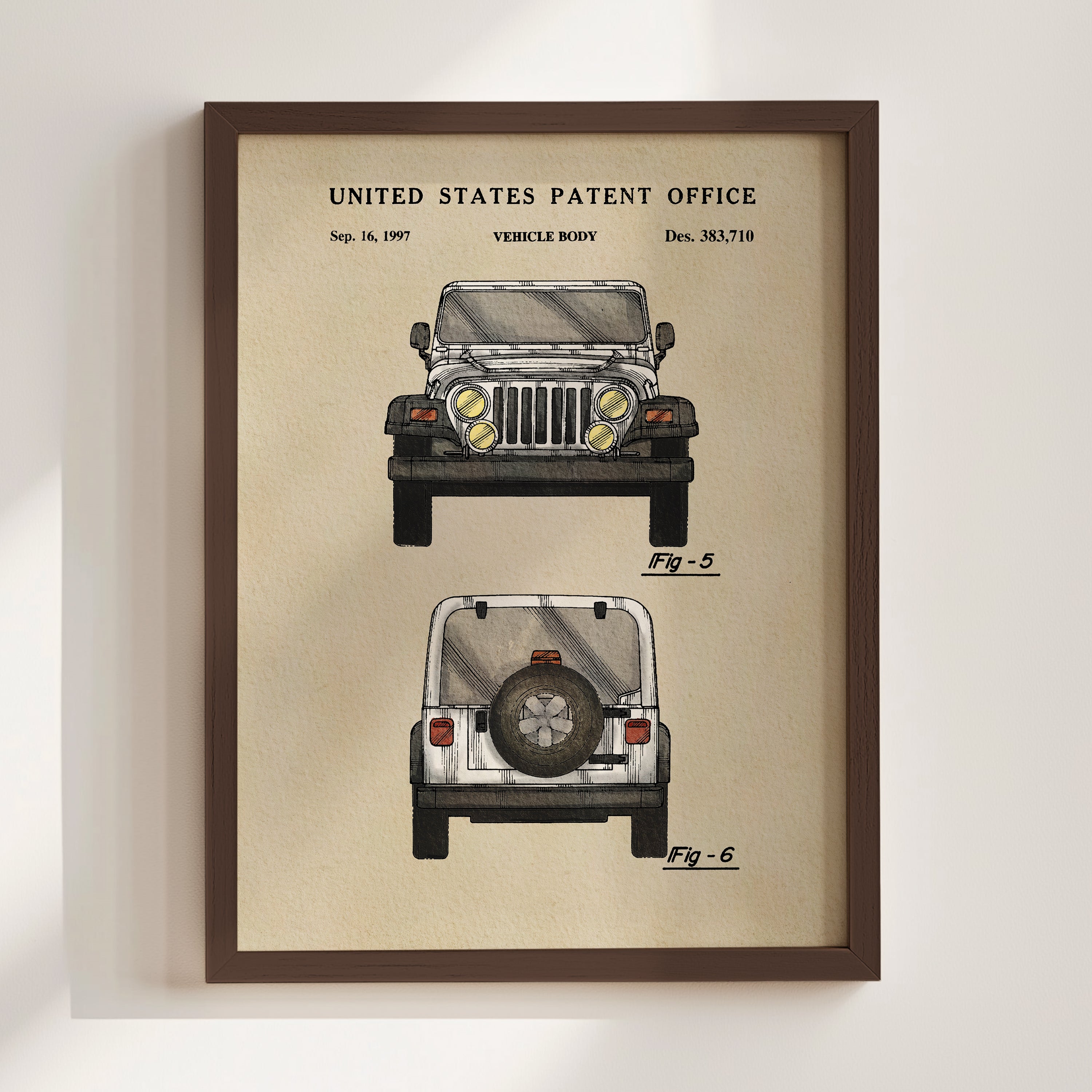 The image is a framed print of a United States patent office vehicle design from 1997, depicting a Jeep Wrangler.