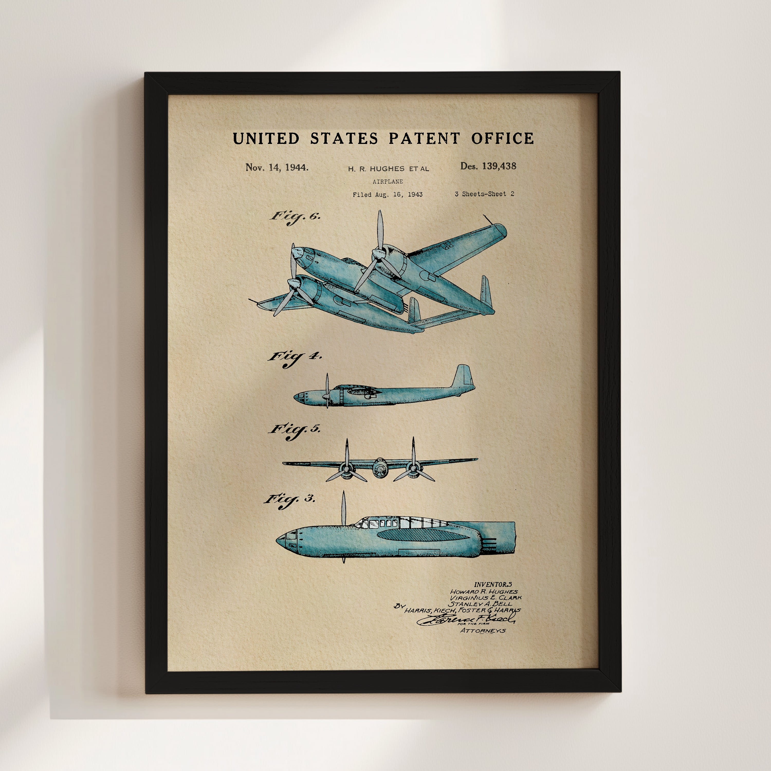 The image is a framed patent drawing of a blue airplane, depicting the design and features of the aircraft.