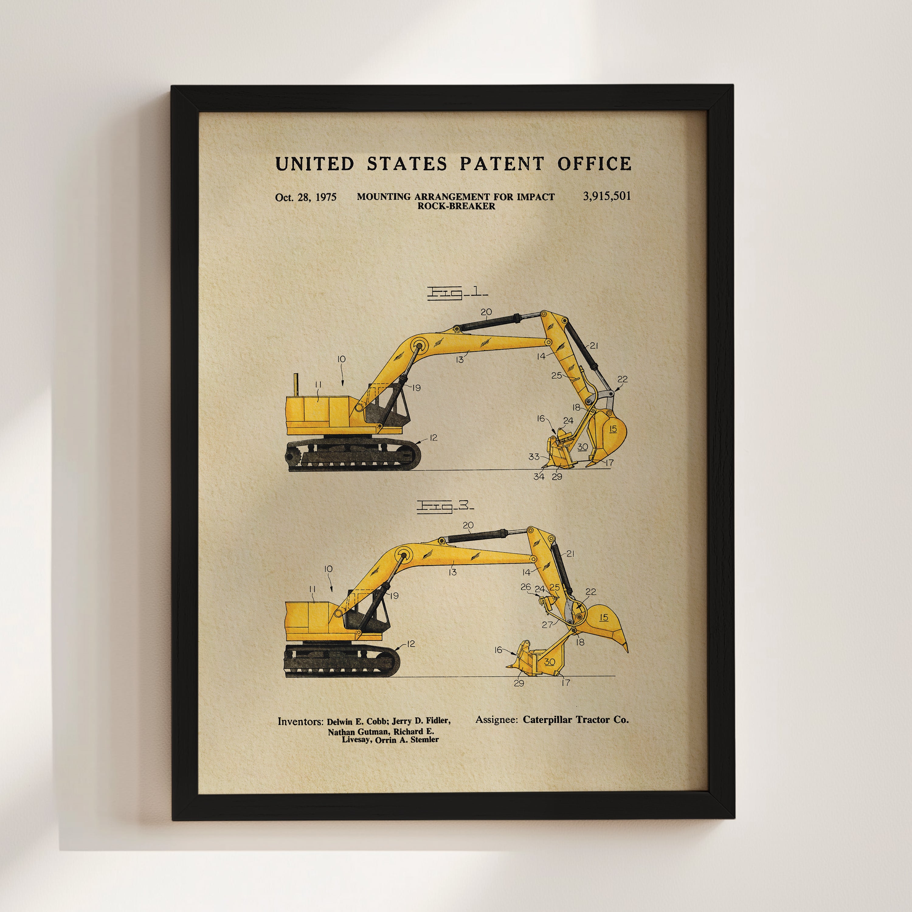 The image is a framed patent illustration depicting two yellow excavators, with detailed technical drawings and labels.