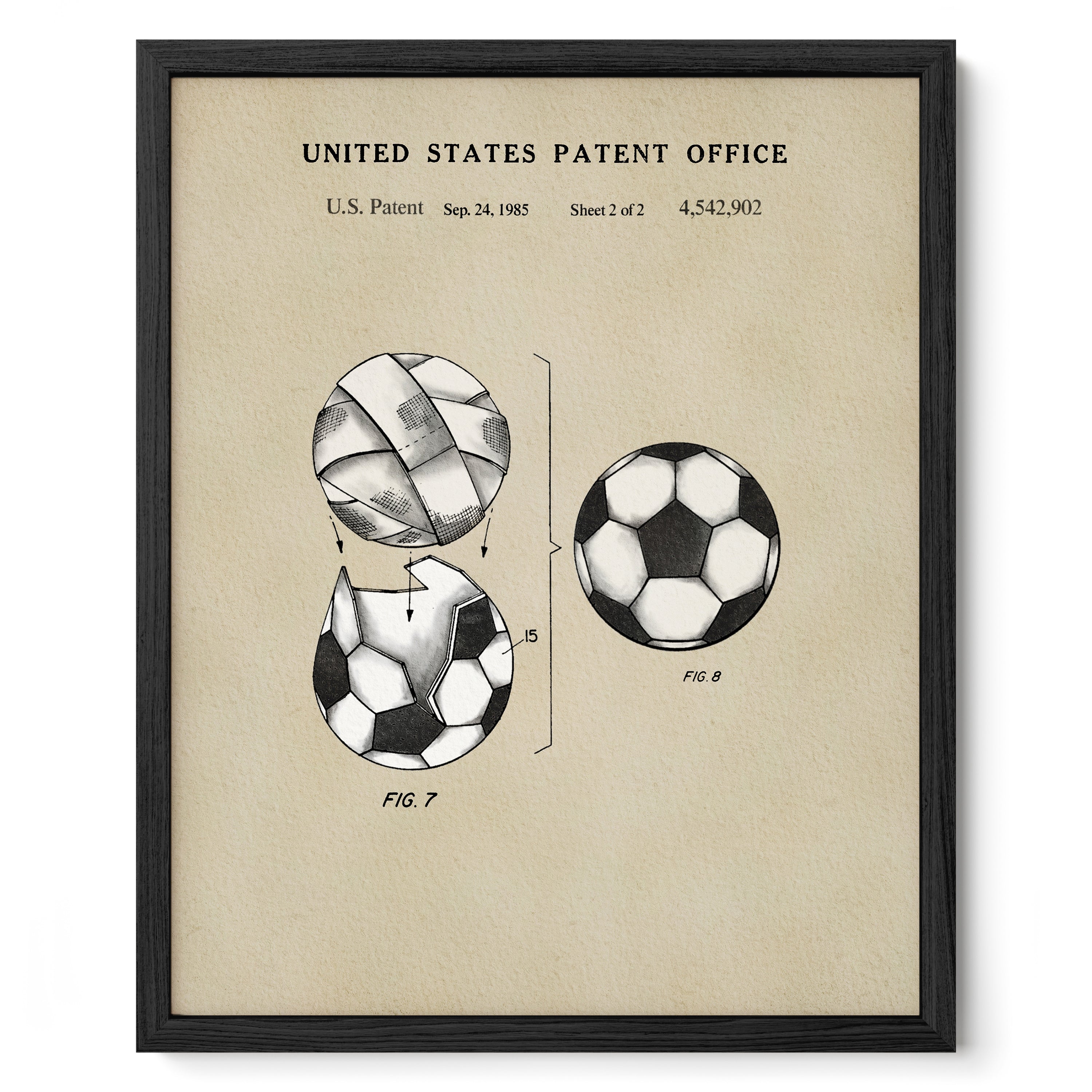The image is a framed print depicting a patent drawing of a soccer ball, with the United States Patent Office and a sheet of patent applications visible.