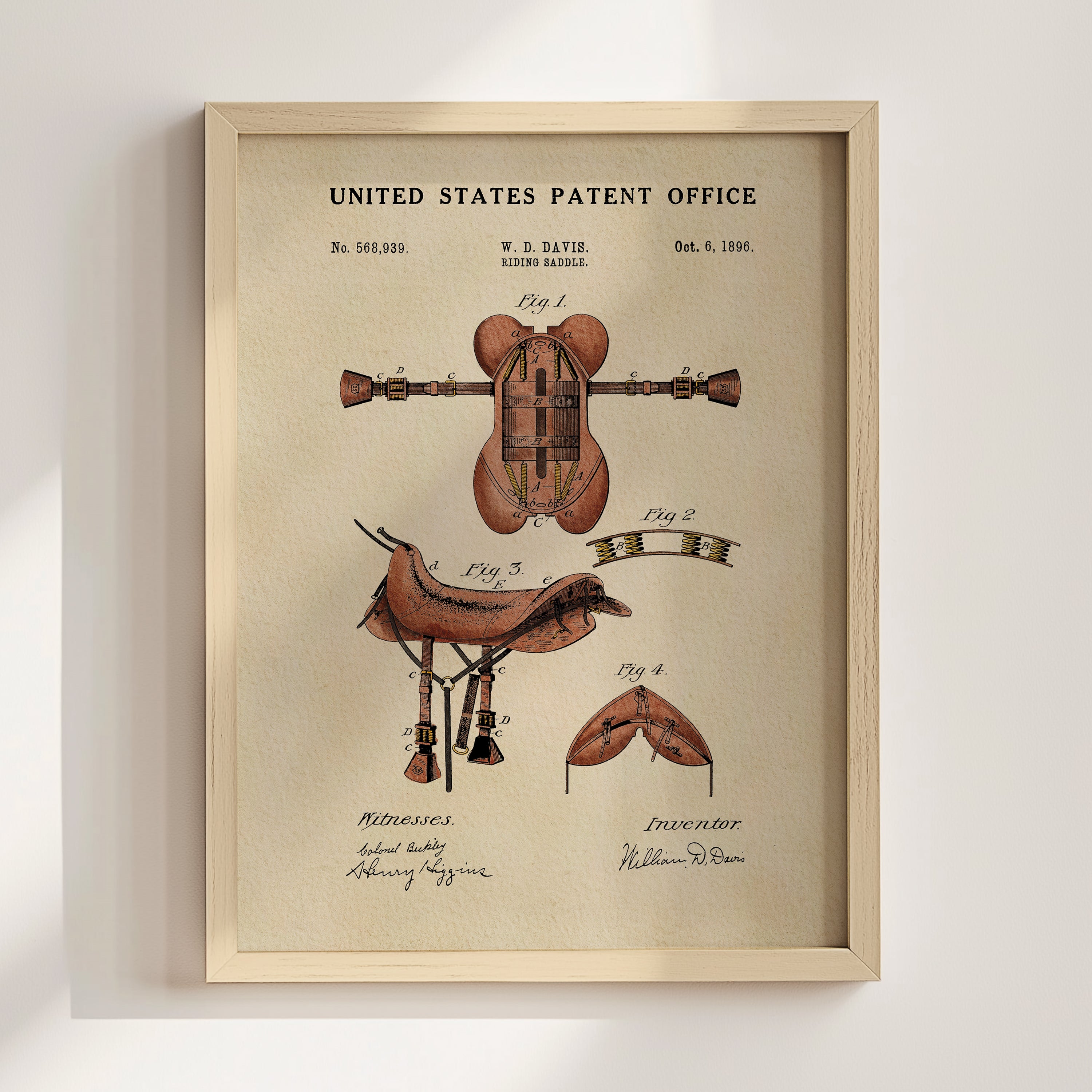 The image is a framed print of a United States patent office patent from 1866, featuring an illustration of a horse saddle and other patent-related drawings.