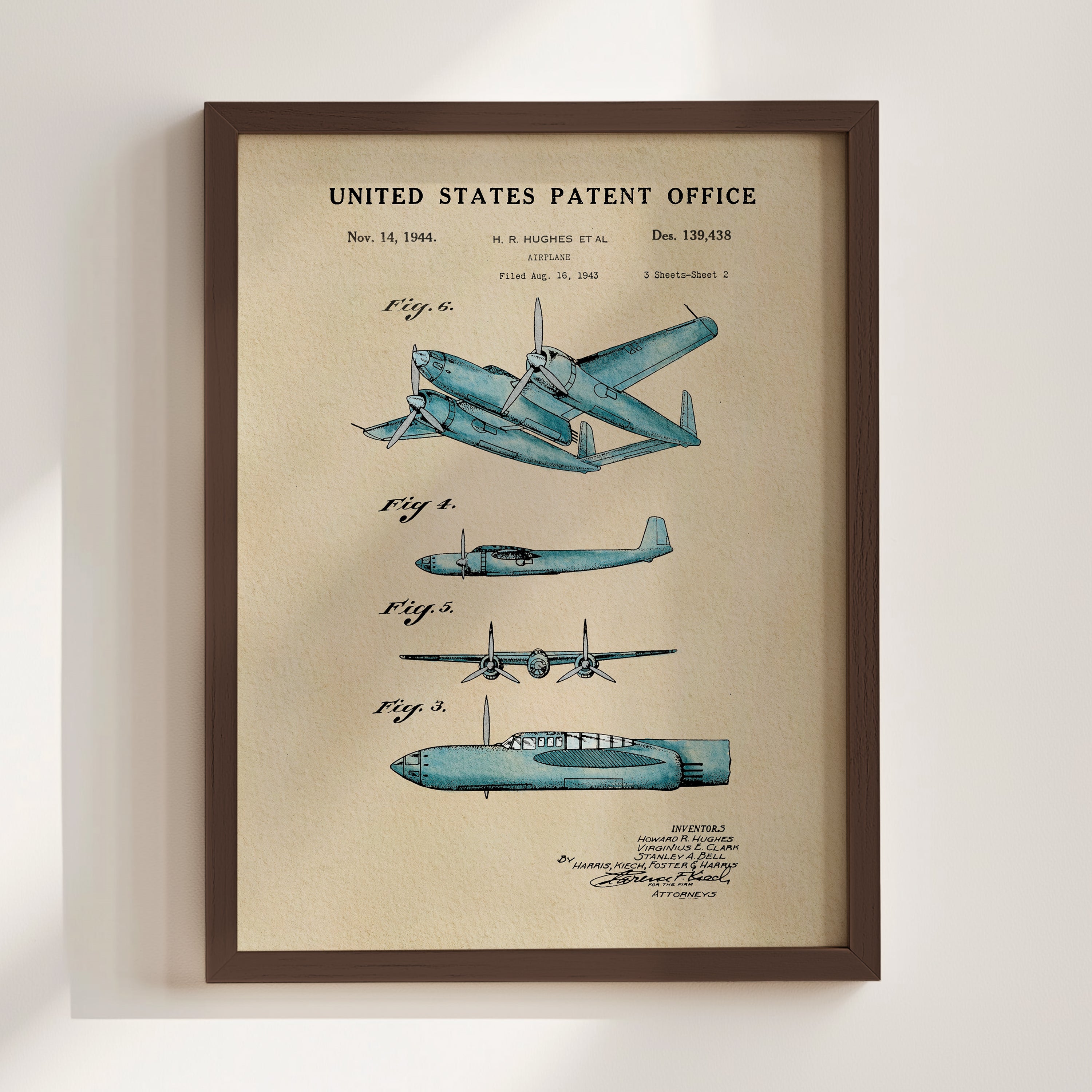The image is a framed patent drawing of a blue airplane, depicting the design and features of the aircraft.