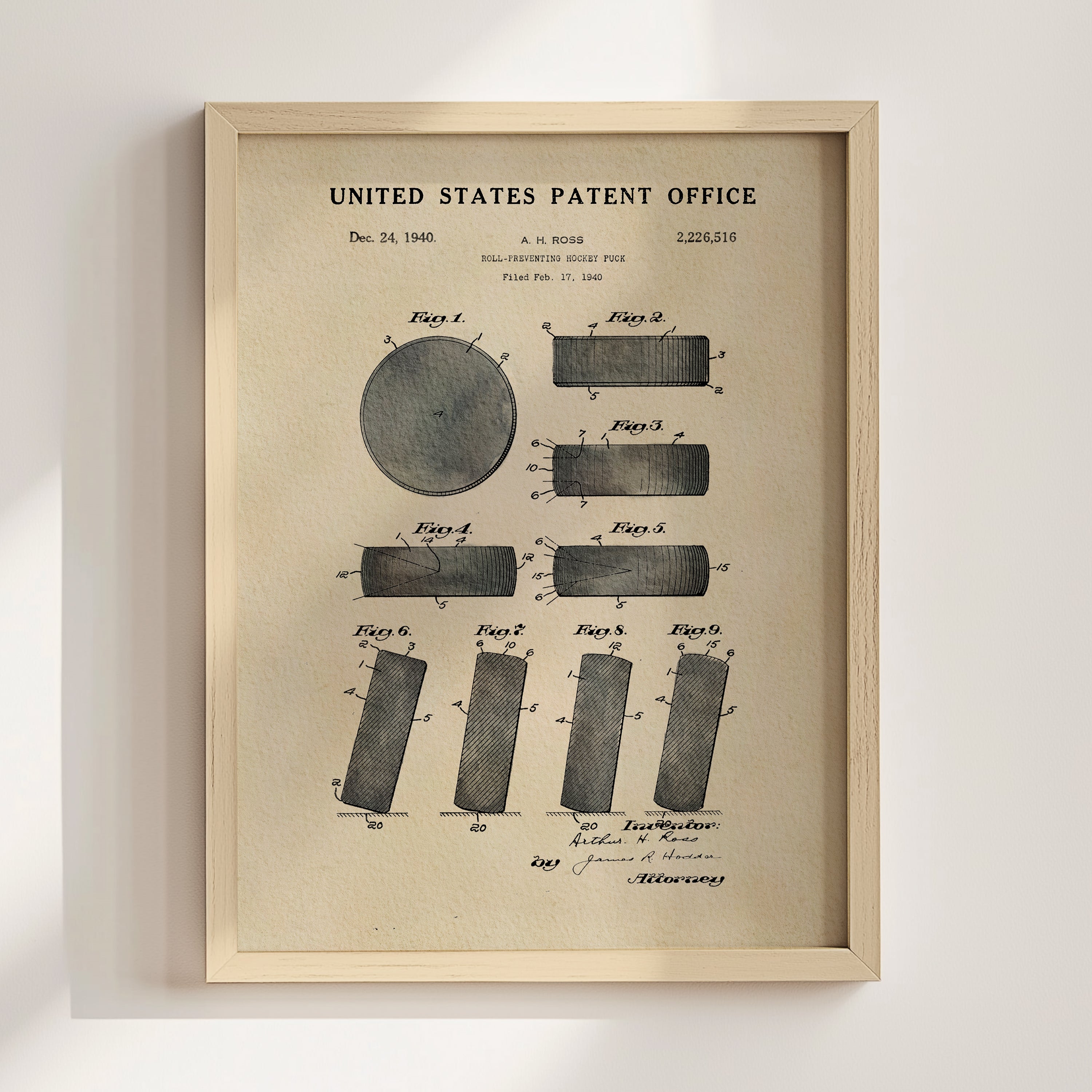 The image is a framed patent drawing from the United States Patent Office, depicting a round object with various geometric shapes surrounding it.