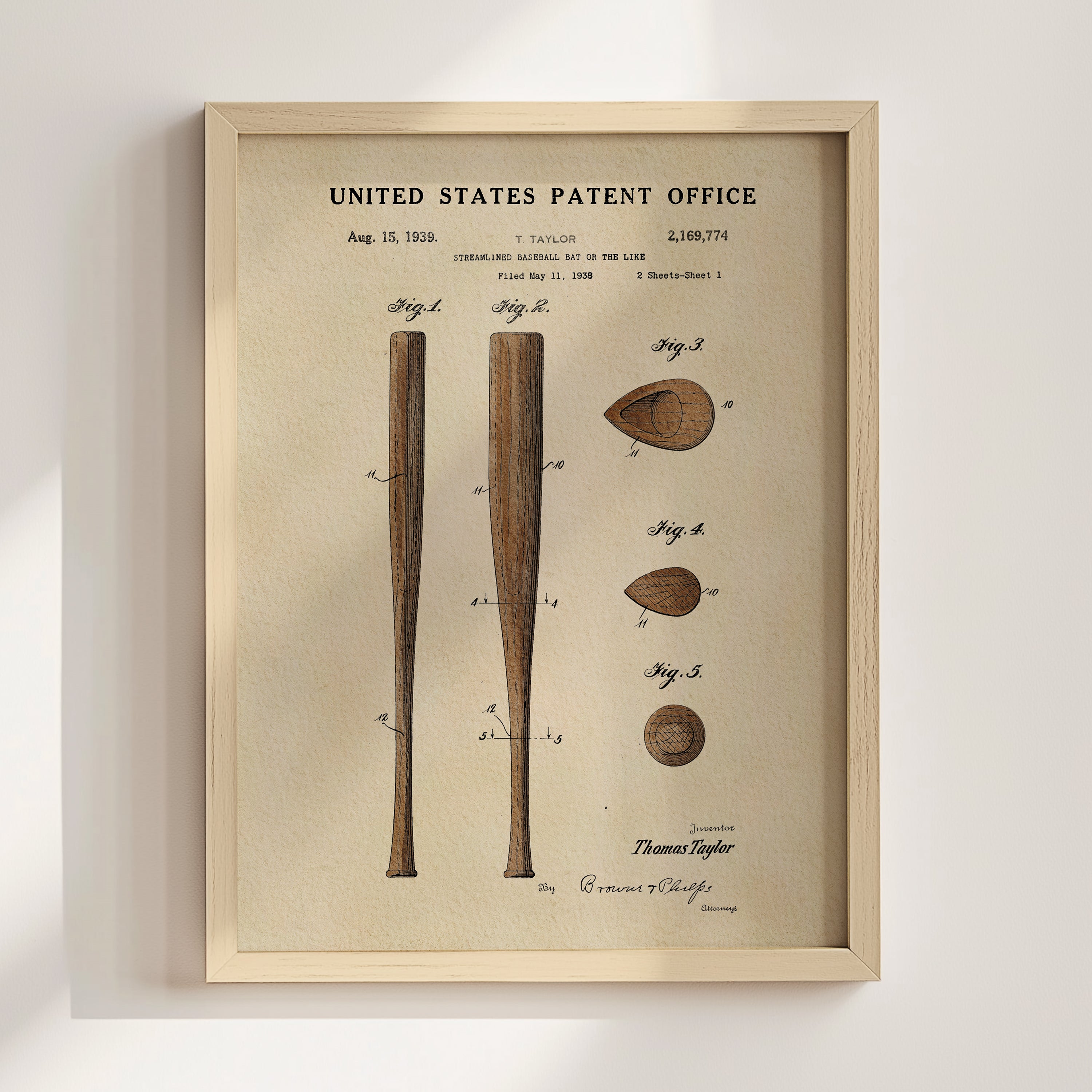 The image is a framed patent drawing of a baseball bat from the year 1935.