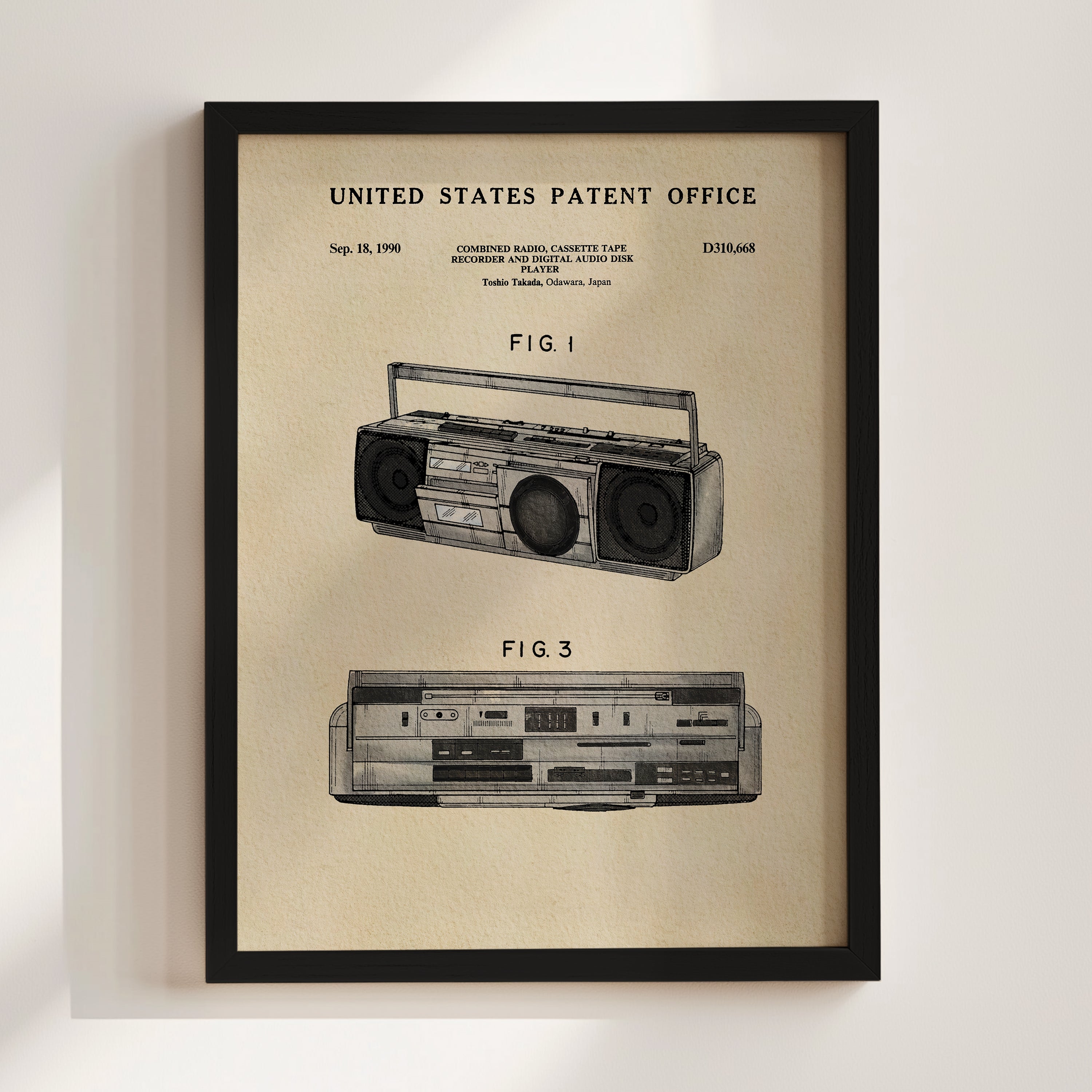 The image is a framed patent drawing of a boombox, depicting the design and features of the device.