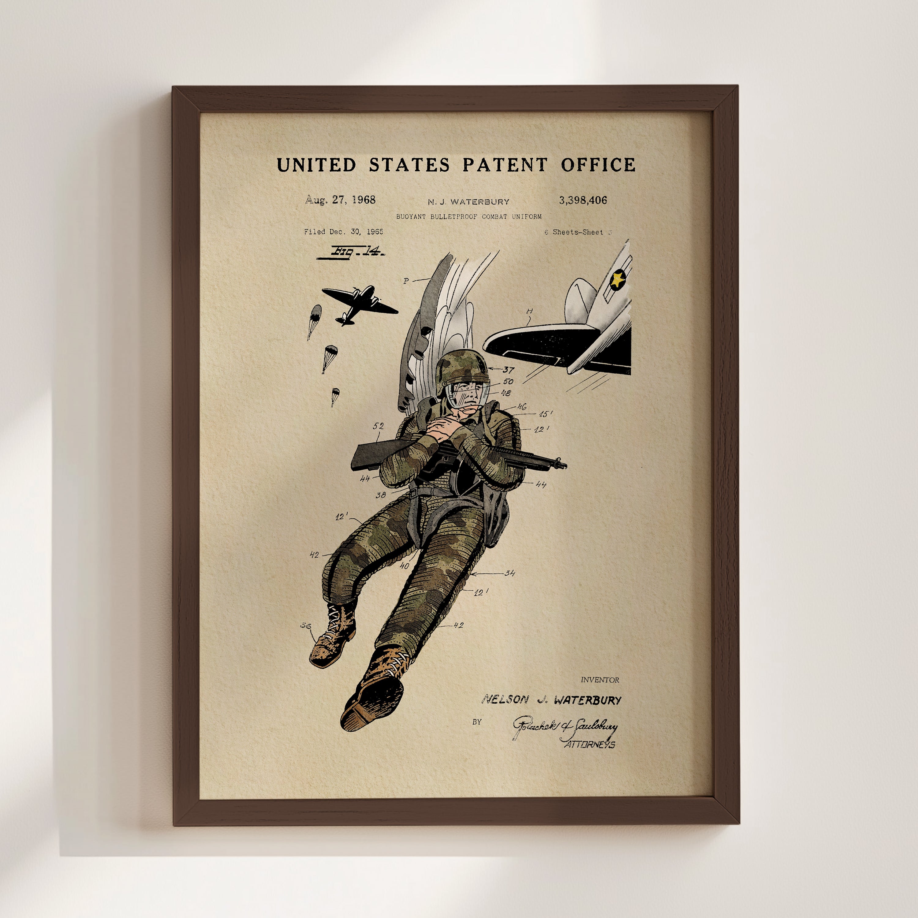 The image is a framed print featuring a military figure in camouflage uniform, holding a rifle, and surrounded by various military-related elements such as parachutes and a plane.