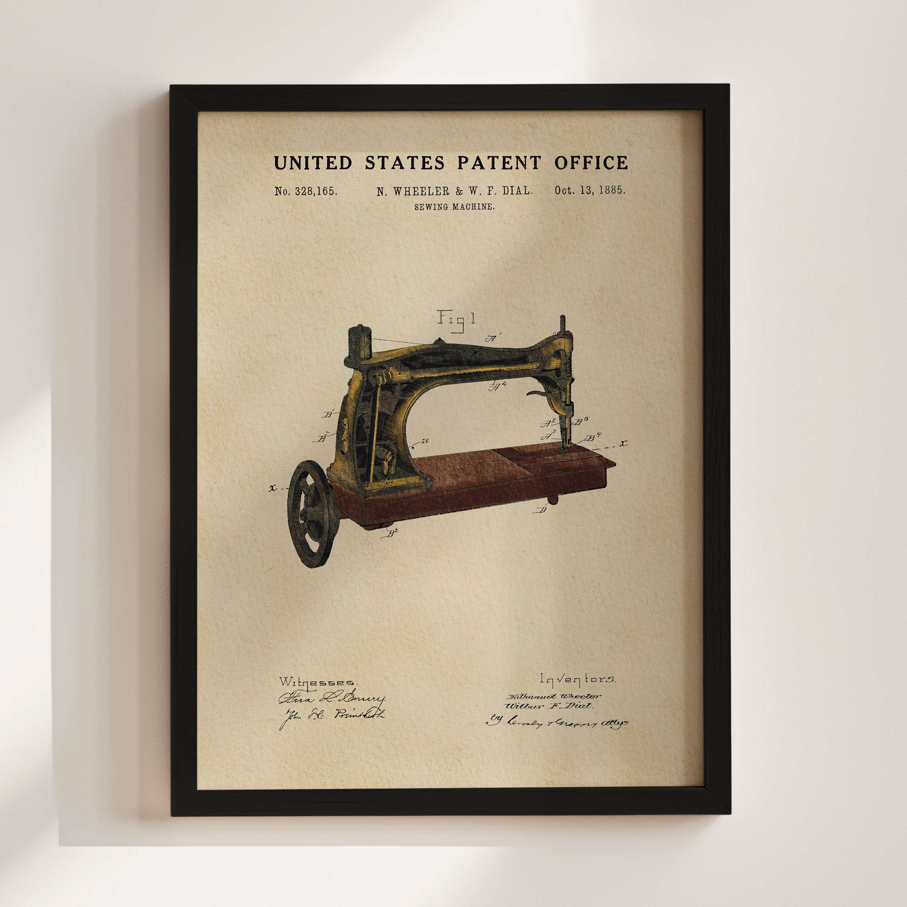 The image is a framed patent drawing of a sewing machine, depicting the invention of the sewing machine by N. Wheeler & W. F. Hall in 1885.