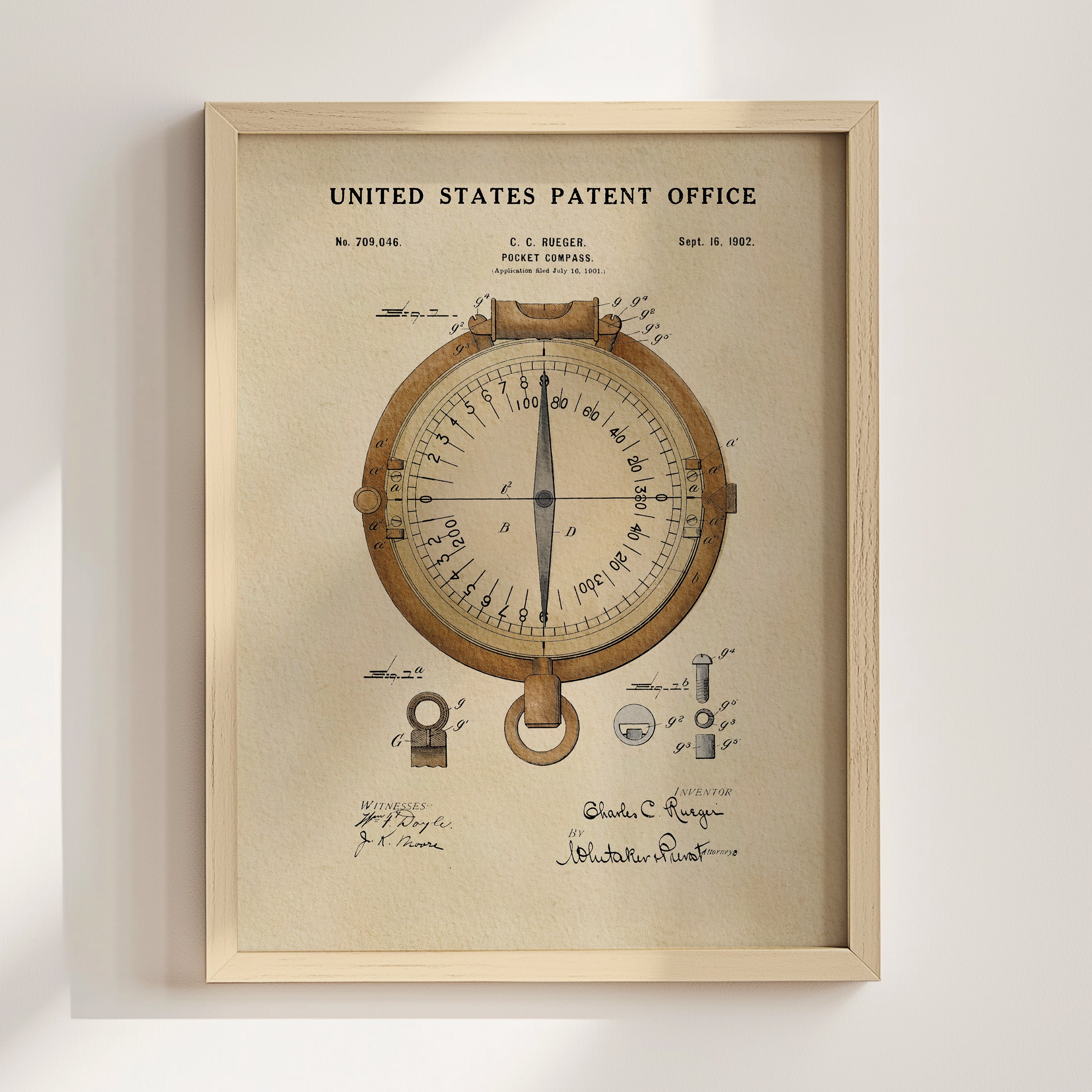 The image is a framed patent drawing of a compass, depicting the United States Patent Office from September 18, 1802.