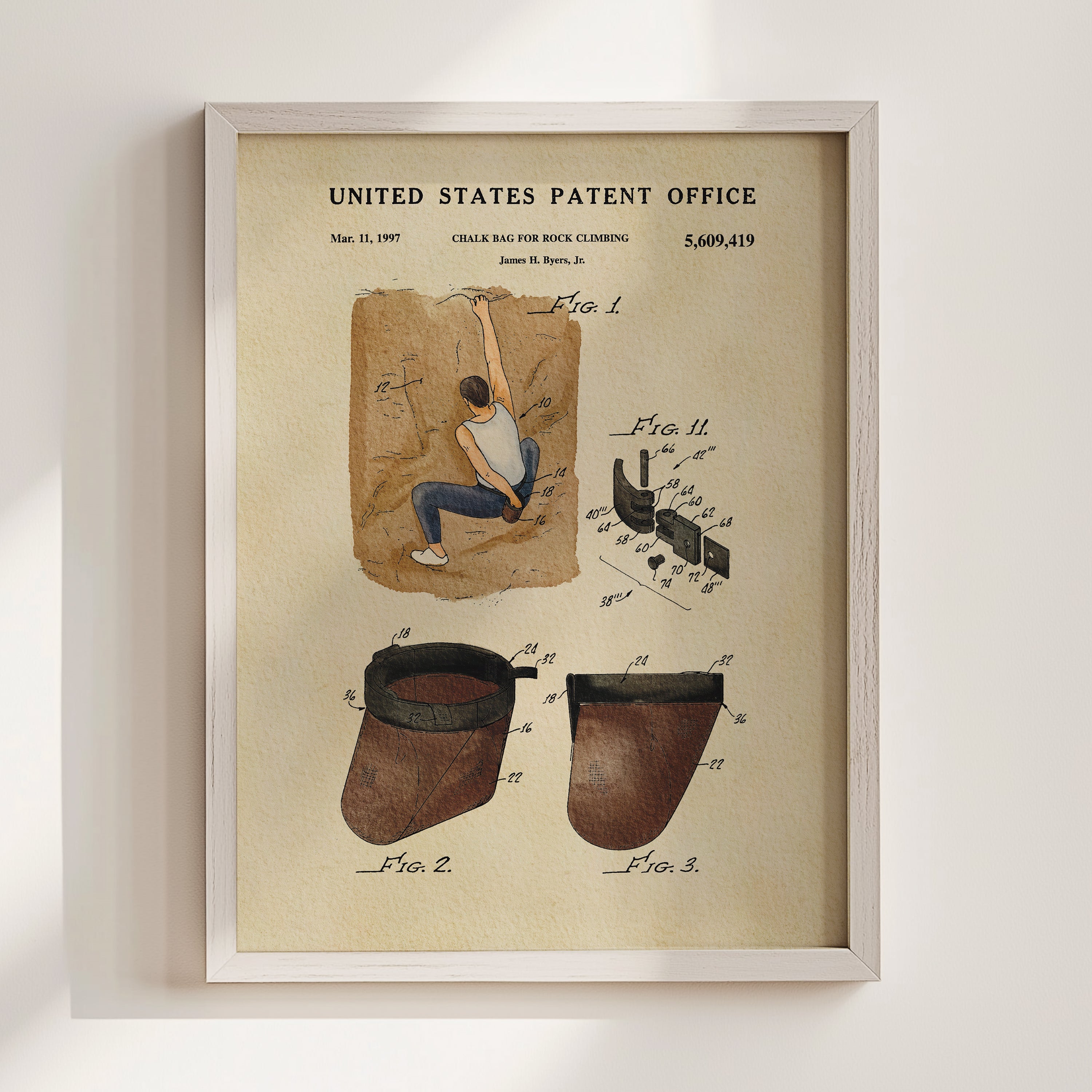 The image is a framed patent drawing depicting a man climbing a rock face, with detailed technical drawings and annotations.