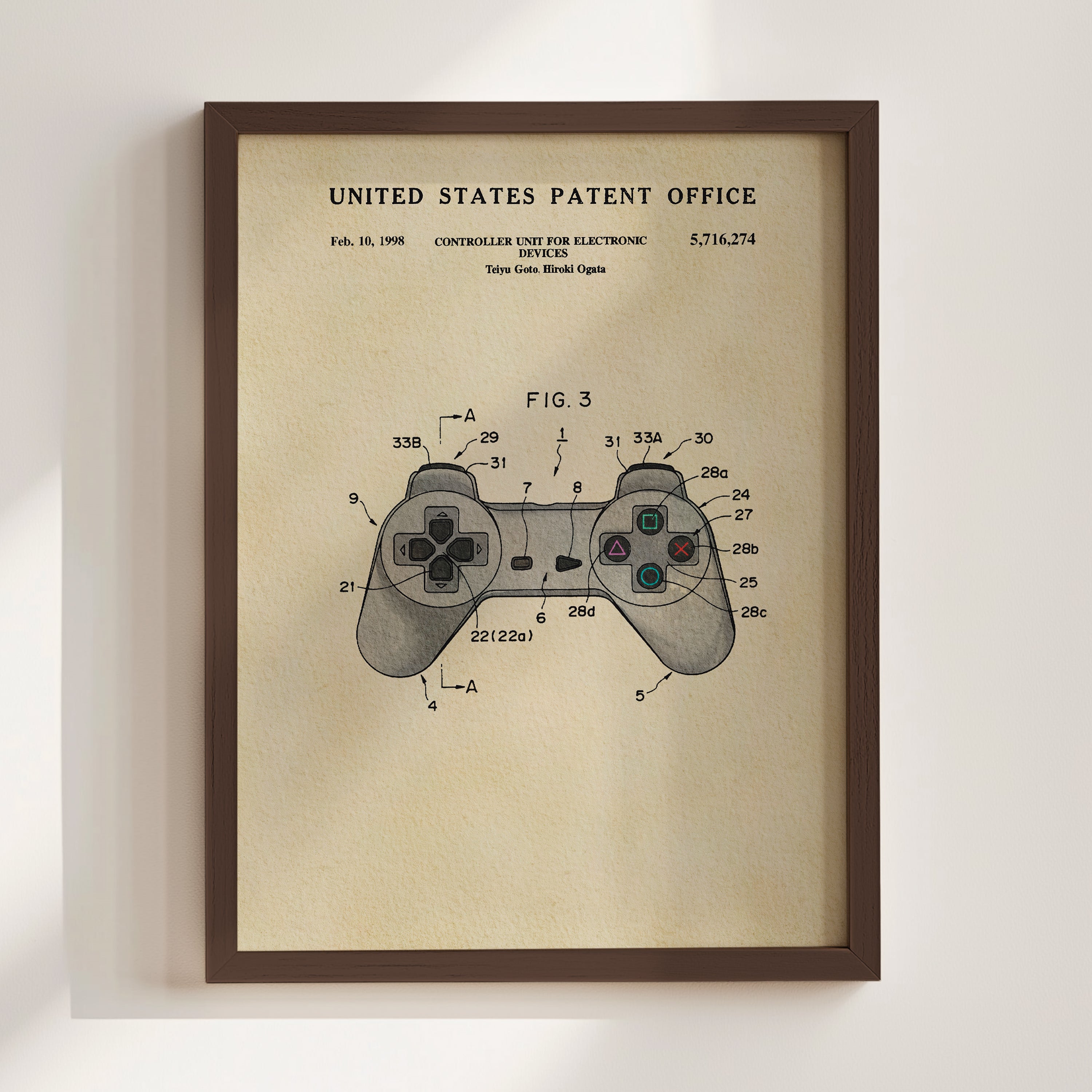 The image is a framed print of a United States patent office patent from February 10, 1998, titled