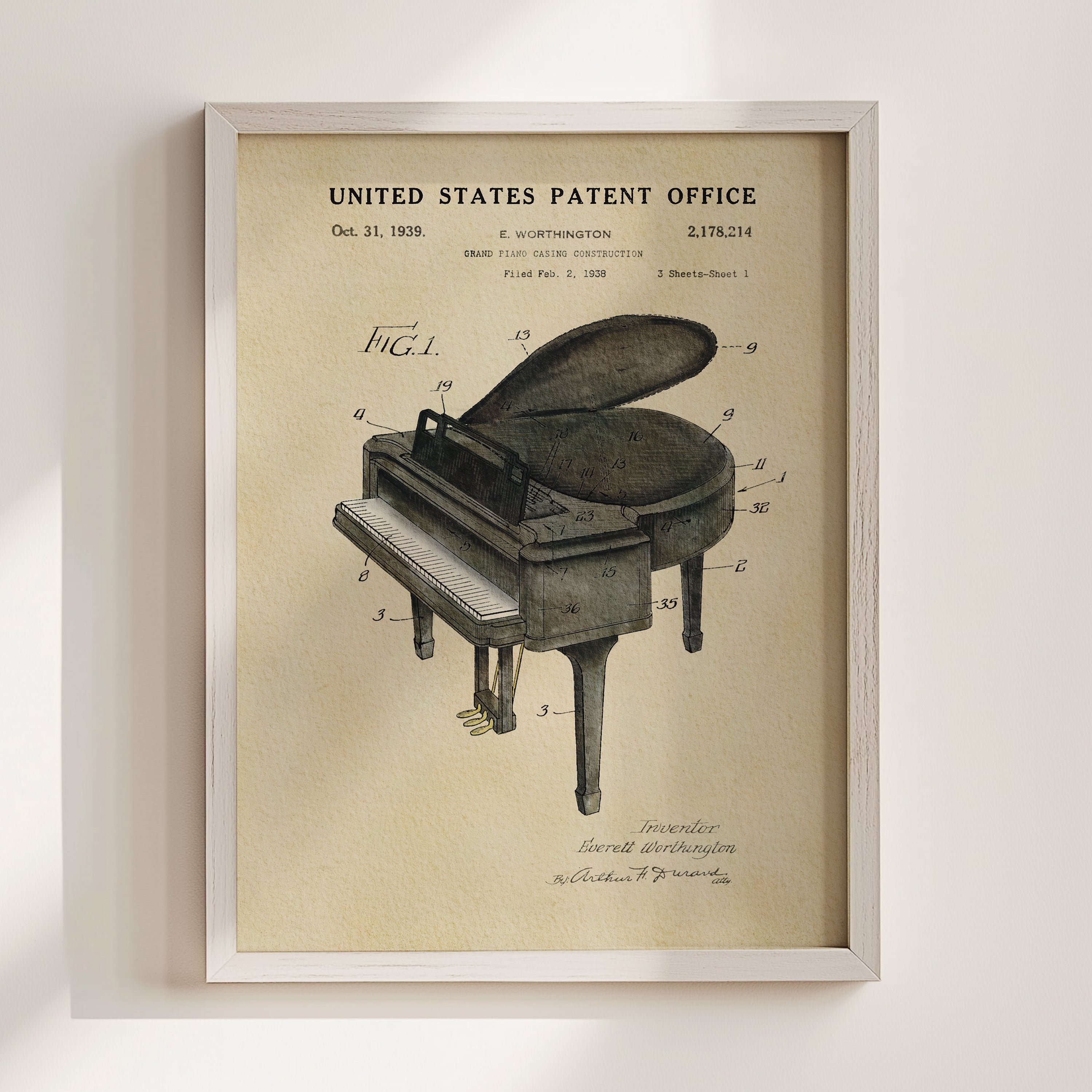 The image is a framed patent drawing of a grand piano, depicting the patent registration and construction details of the instrument.