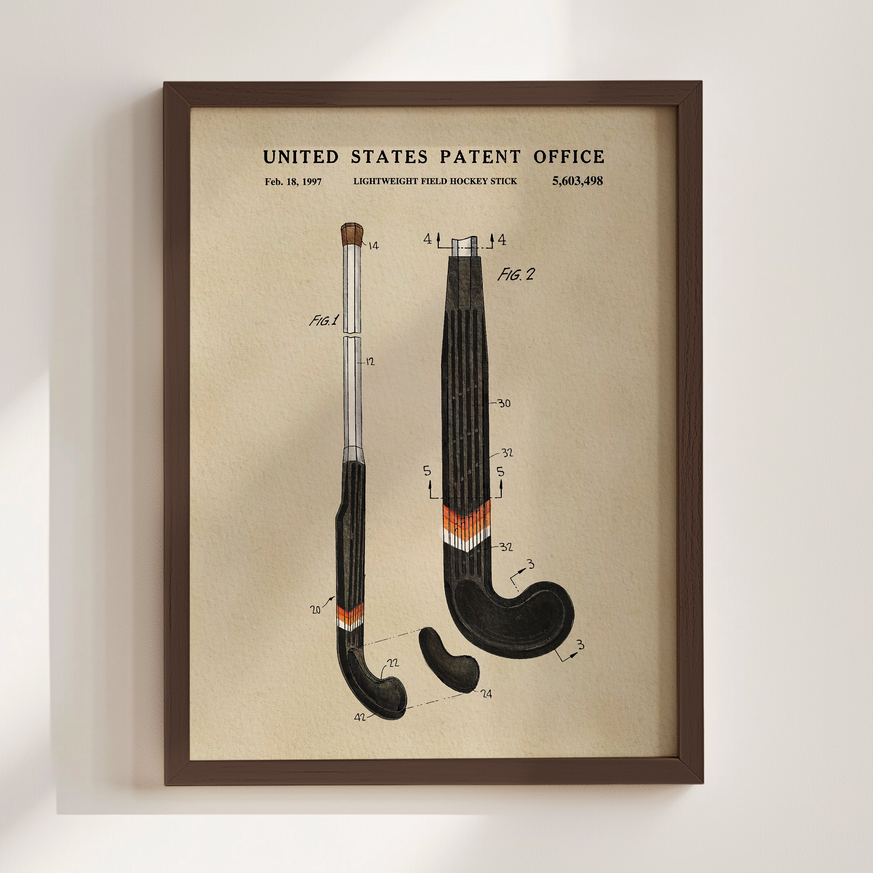The image is a framed patent drawing of a hockey stick, depicting the design and features of the stick in a technical drawing style.