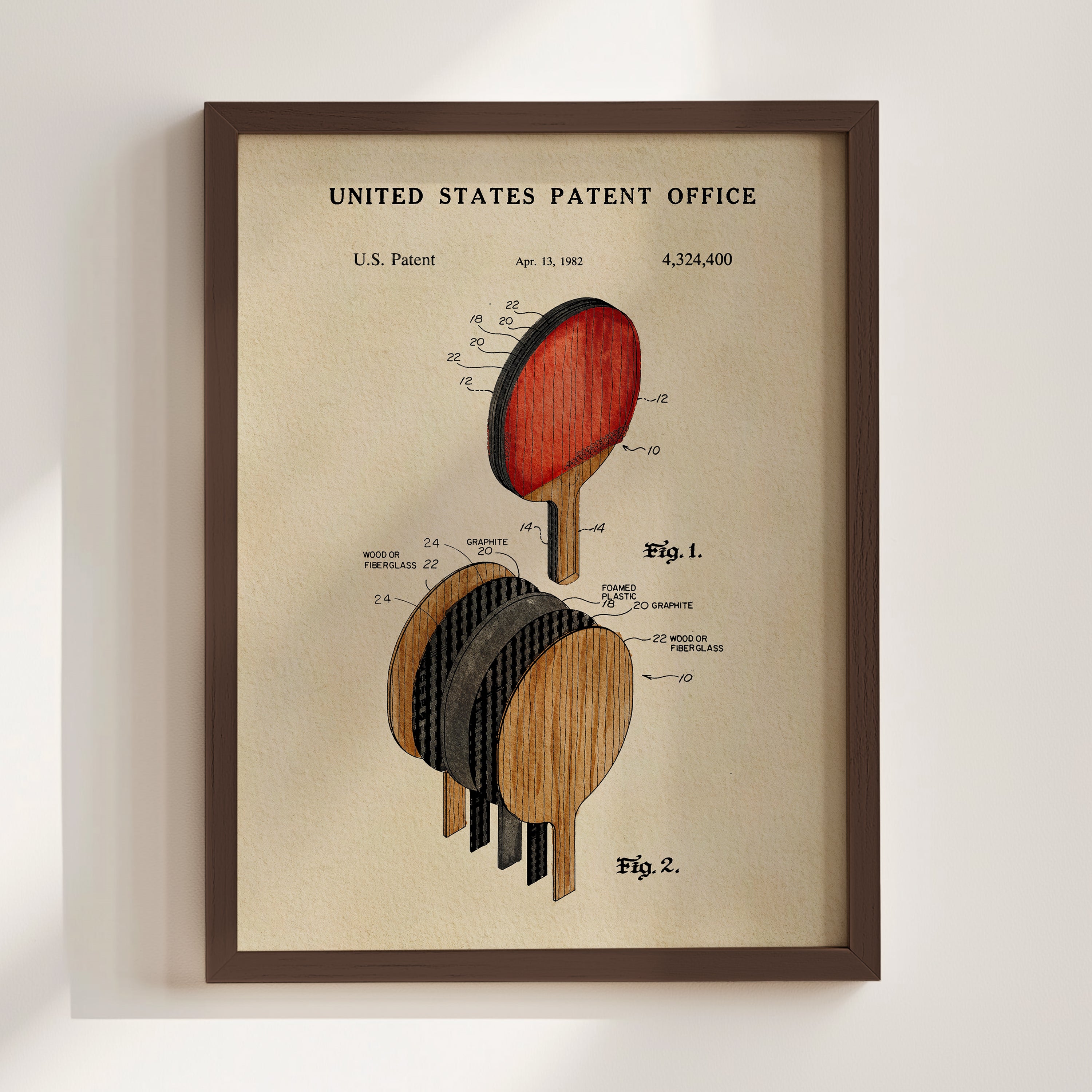 The image is a framed vintage patent drawing of a paddle, depicting the design and features of the paddle in a detailed manner.