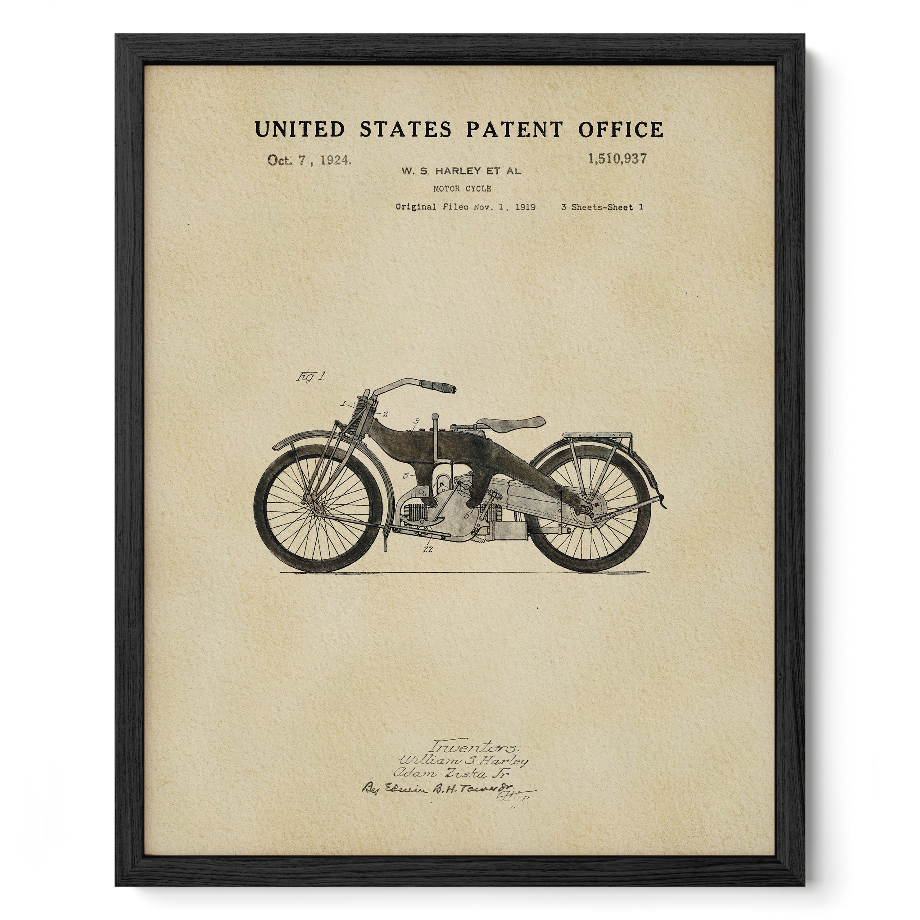 The image is a framed patent drawing of a motorcycle, depicting a vintage Harley Davidson motorcycle from the early 20th century.