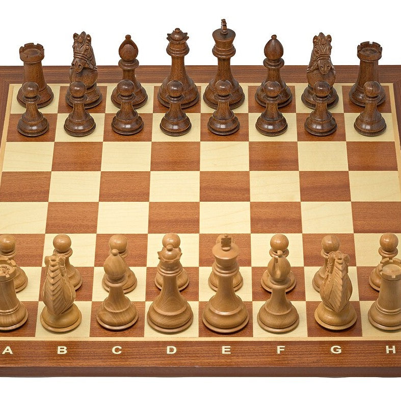 A wooden Staunton chess set on a board