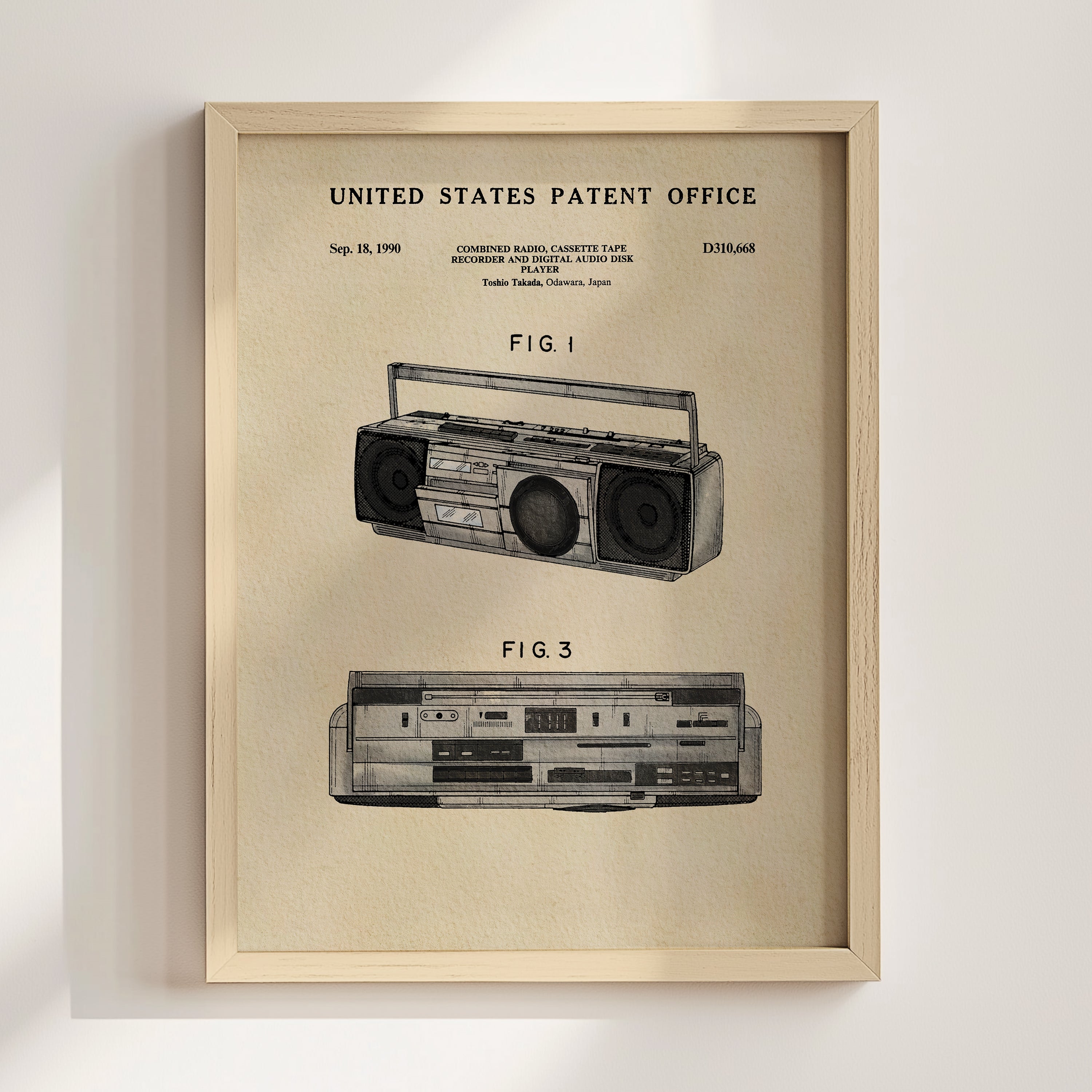 The image is a framed patent drawing of a boombox, depicting the design and features of the device.