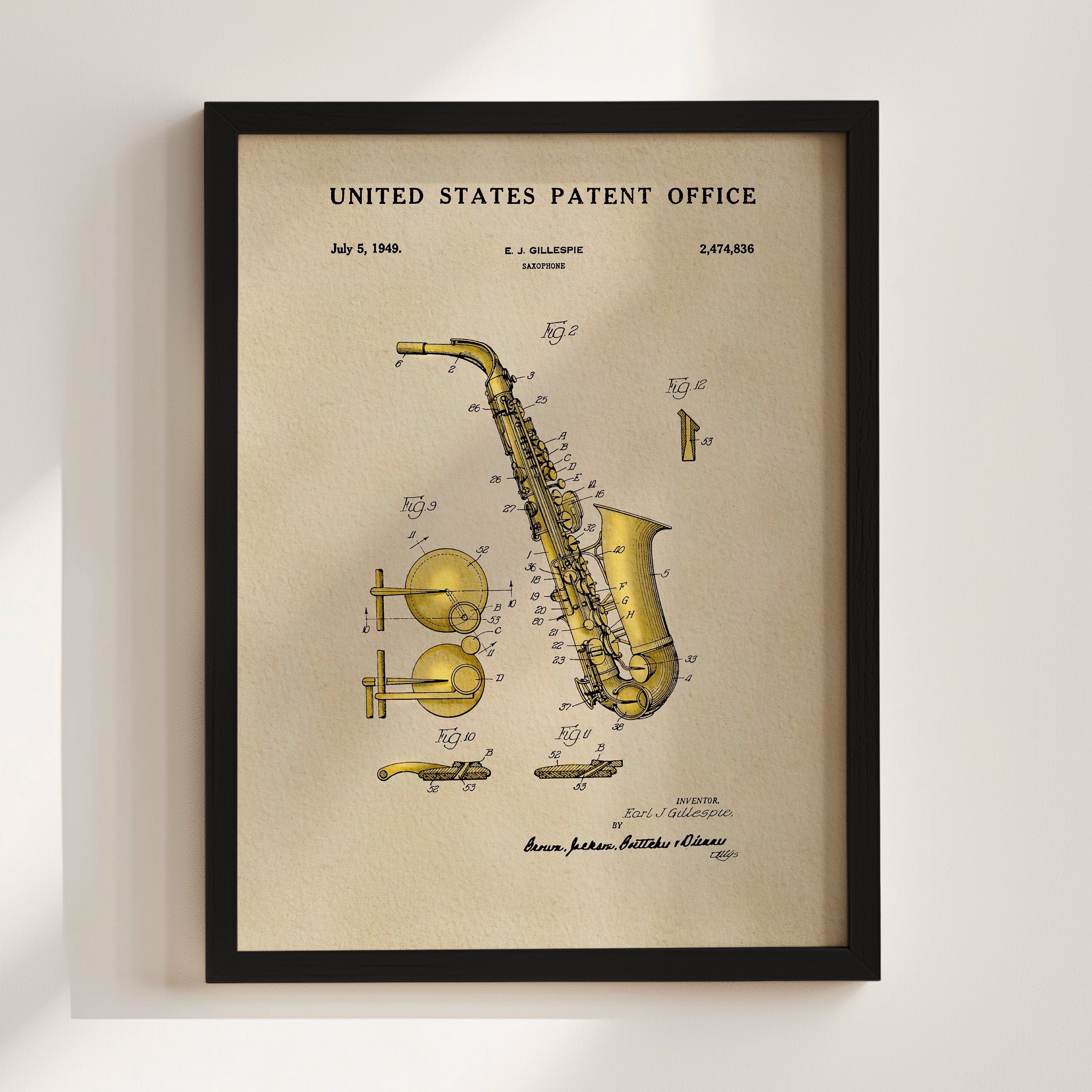 The image is a framed patent drawing of a saxophone, depicting its various components and design.