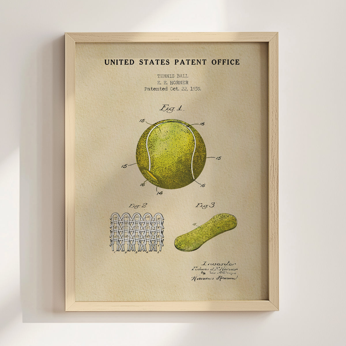The image is a framed poster featuring a tennis ball and a racket, along with a diagram and text related to the patent of the tennis ball.