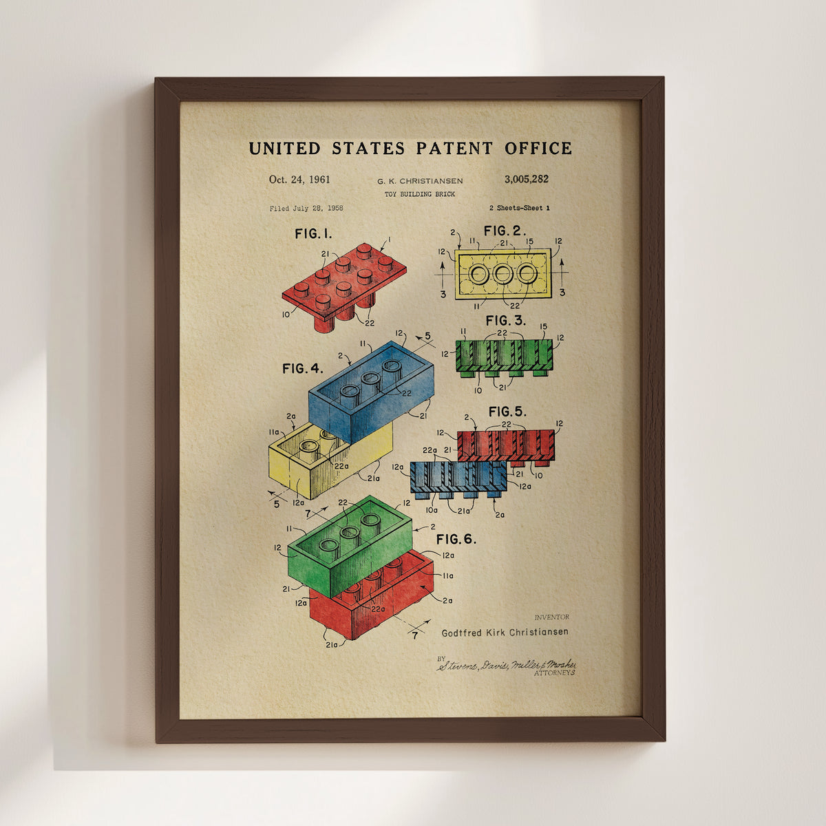 The image is a framed patent drawing from the United States Patent Office, depicting various Lego brick designs and their corresponding patent applications.