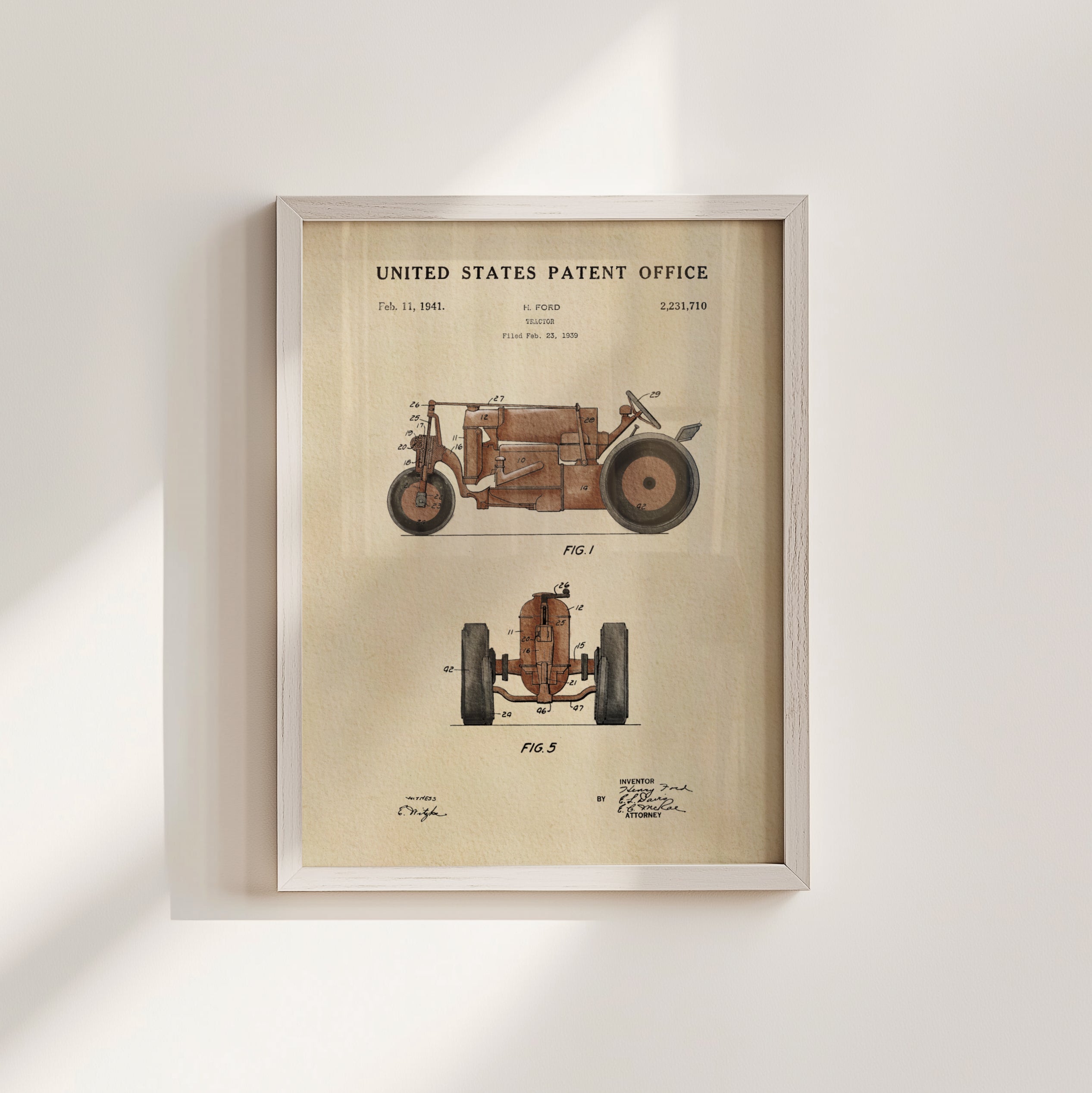 The image is a framed patent drawing of a vehicle, specifically a tractor, with detailed technical drawings and specifications.