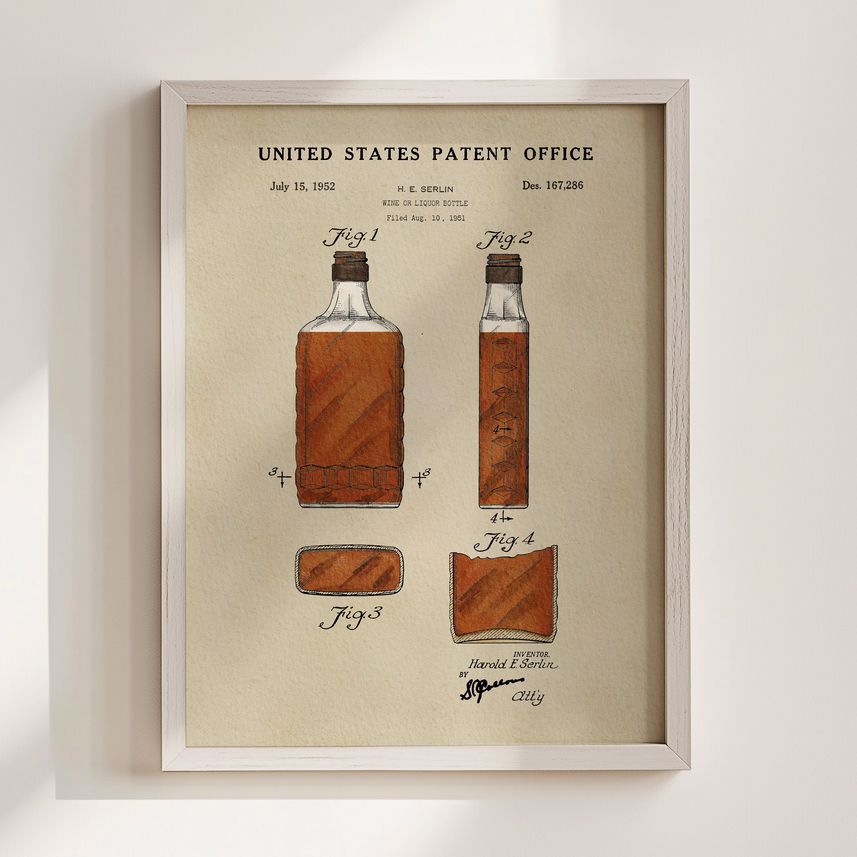 The image is a framed print of a United States patent office patent from July 15, 1952. It features a detailed illustration of a bottle of whiskey, along with the text 