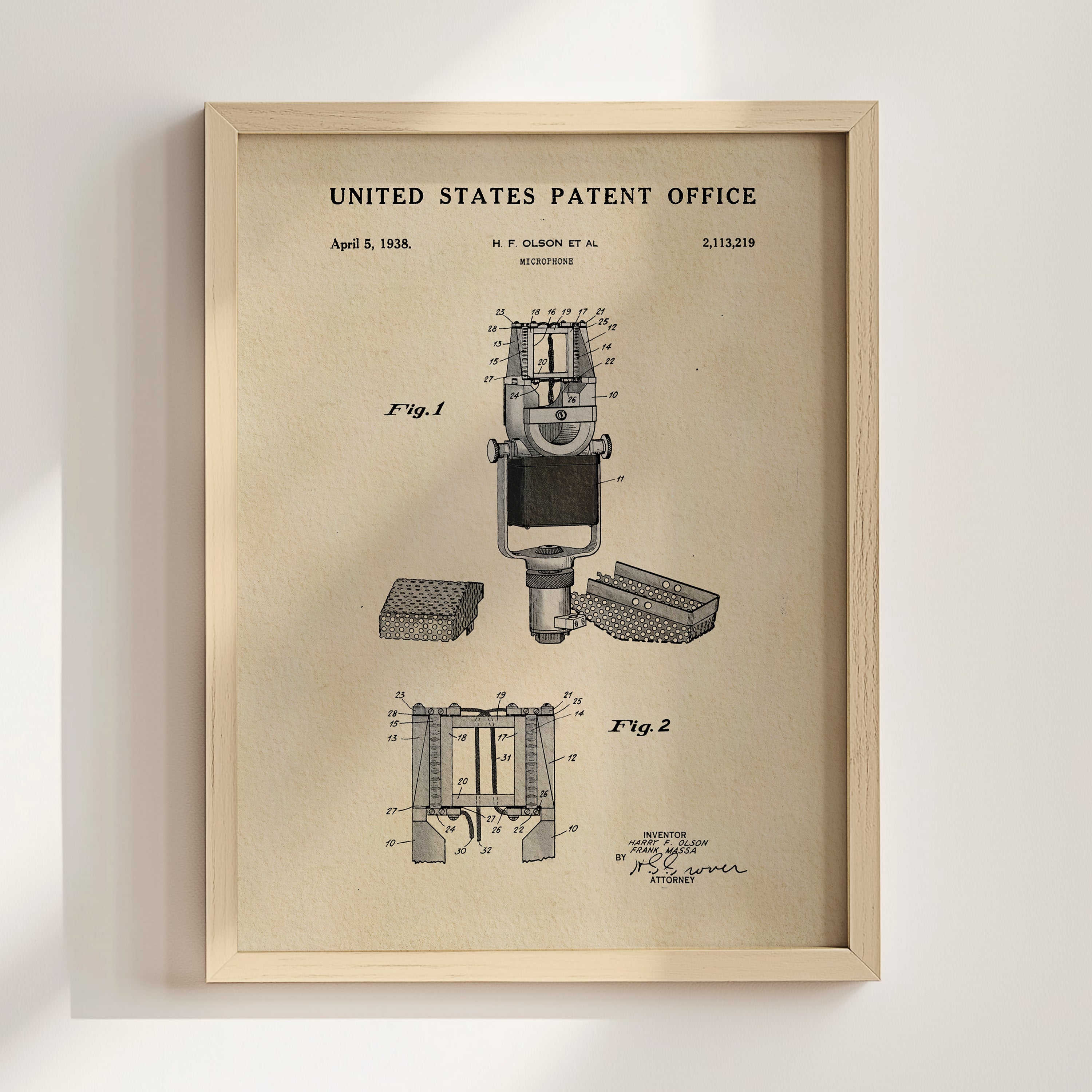 The image is a framed patent drawing from the United States Patent Office, depicting a microphone with various technical drawings and specifications.