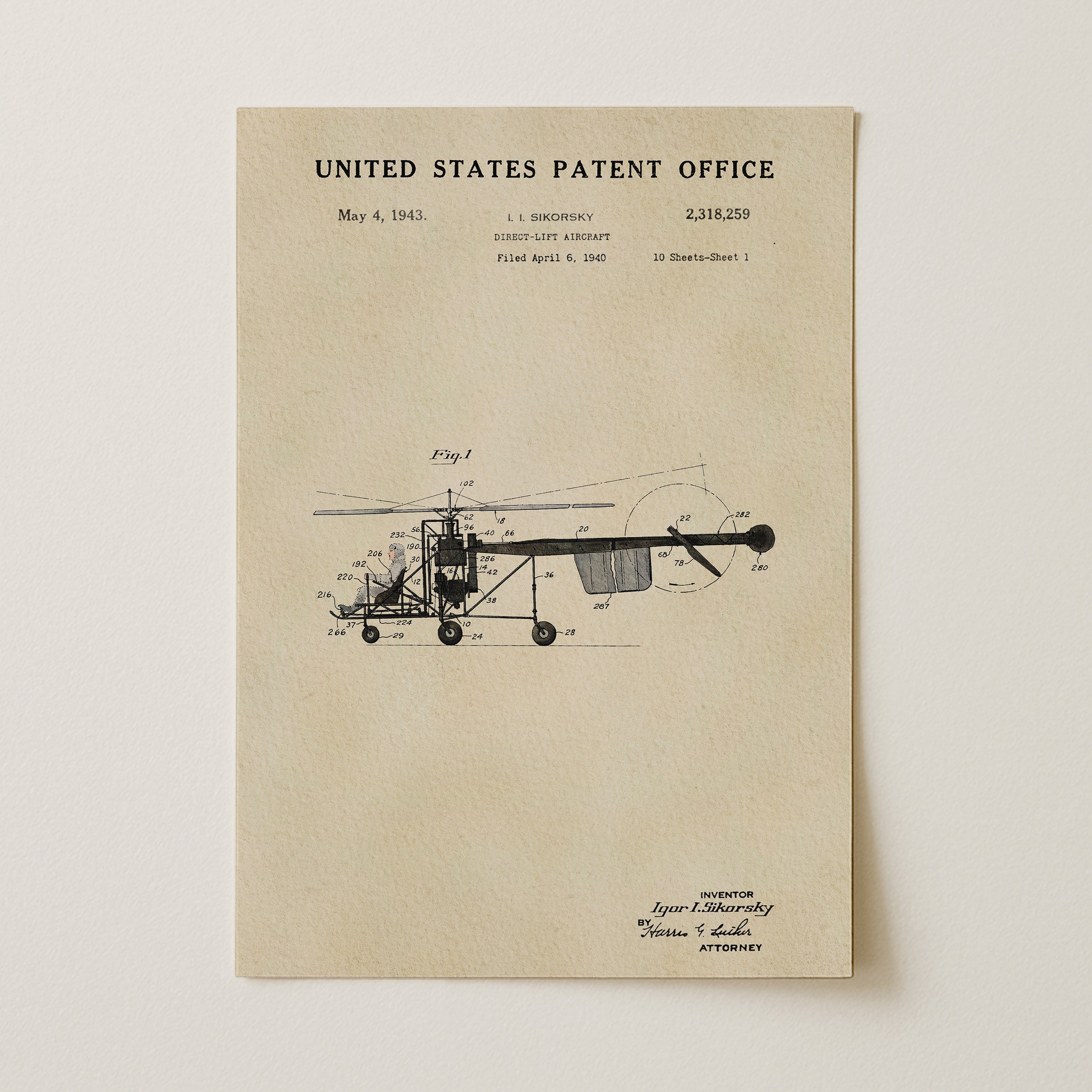 The image is a patent application from the United States Patent Office dated May 4, 1943, featuring a drawing of a helicopter with technical drawings and specifications.